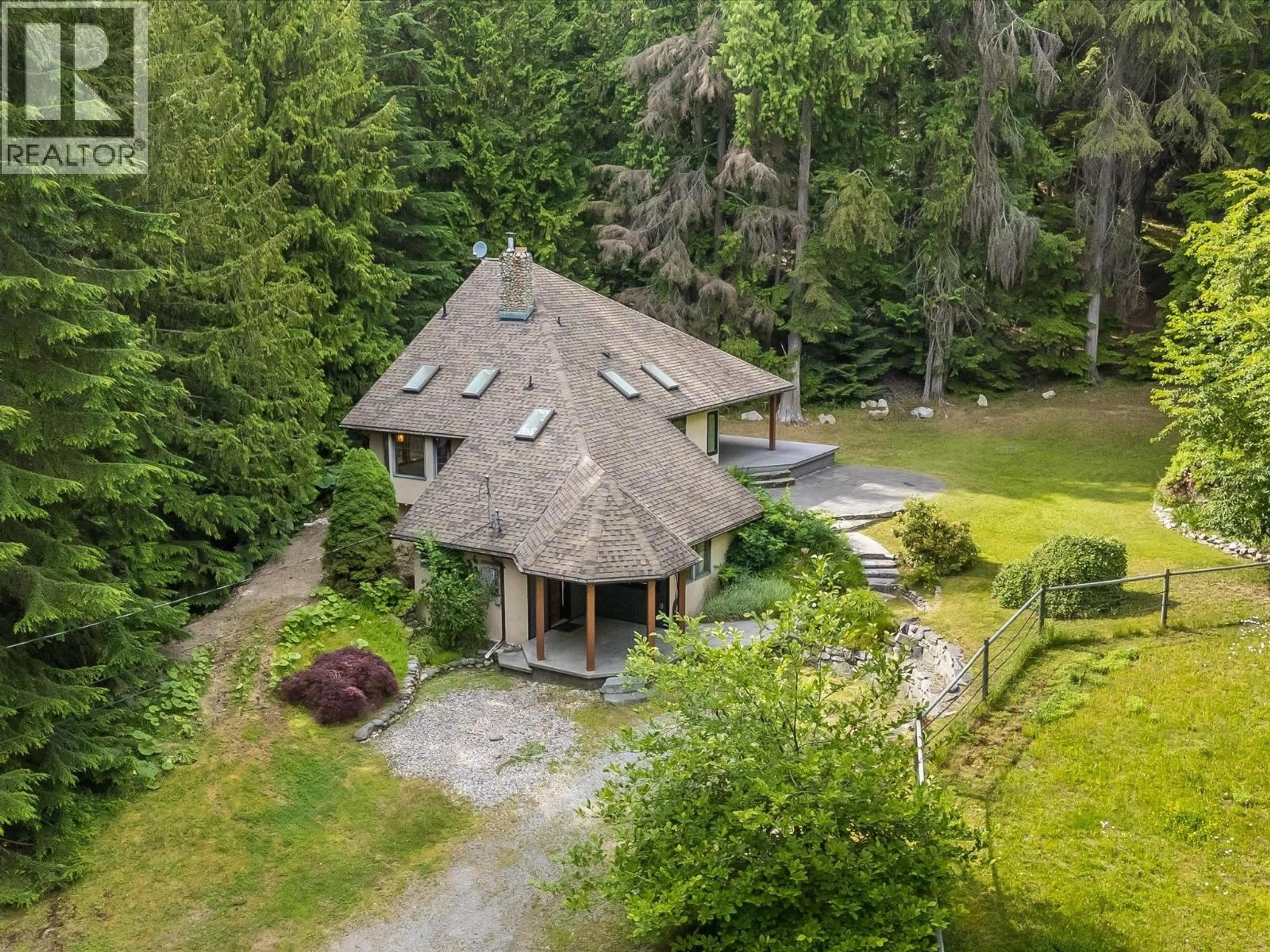 A pic from outside/outdoor area/front of a property/back of a property/a pic from drone, forest/trees view for 4225 3A HIGHWAY, Nelson British Columbia V1L6N1