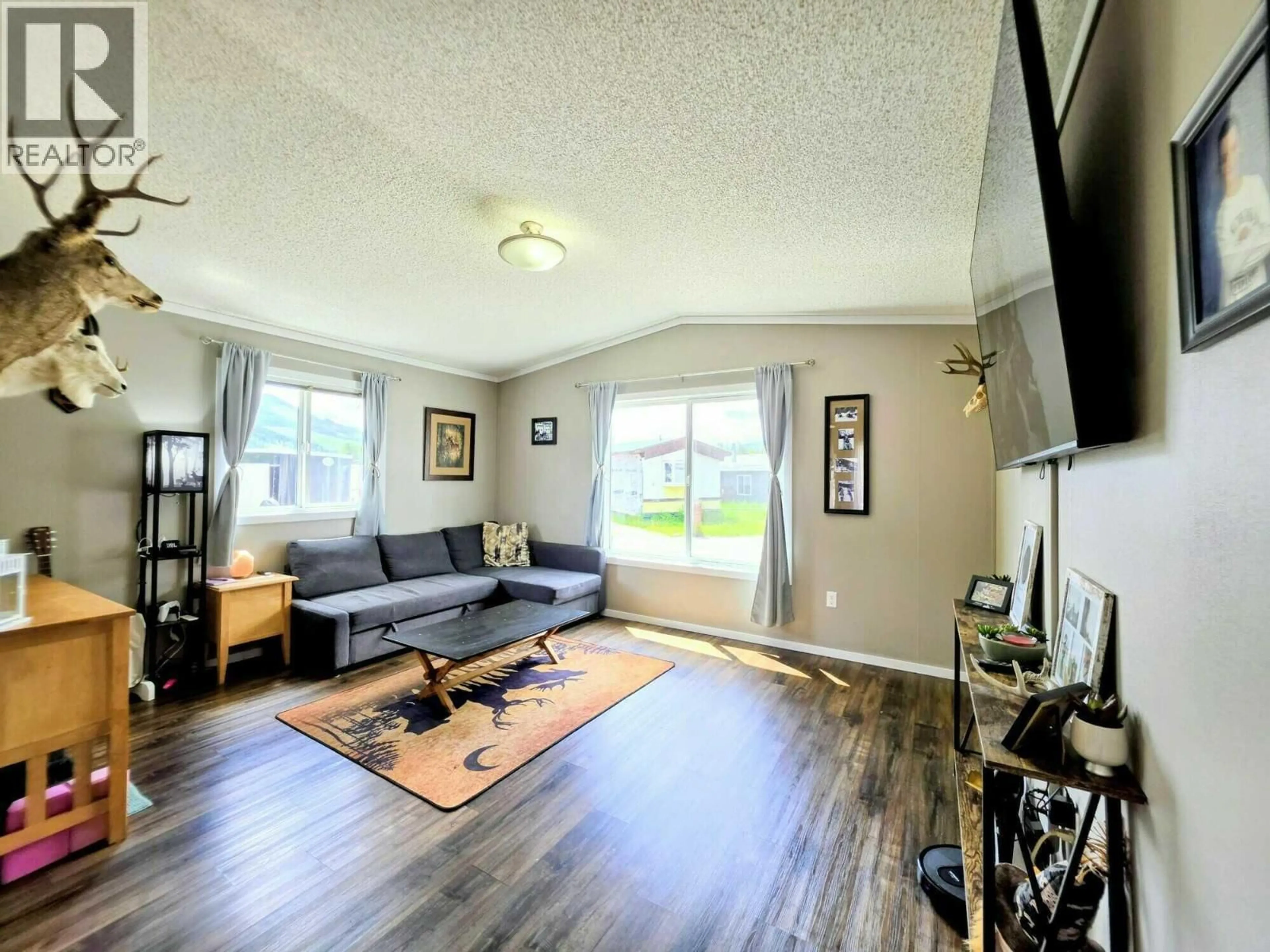 Living room with furniture, wood/laminate floor for 7 - 6210 LOWER ELK VALLEY ROAD, Sparwood British Columbia V0B2G3