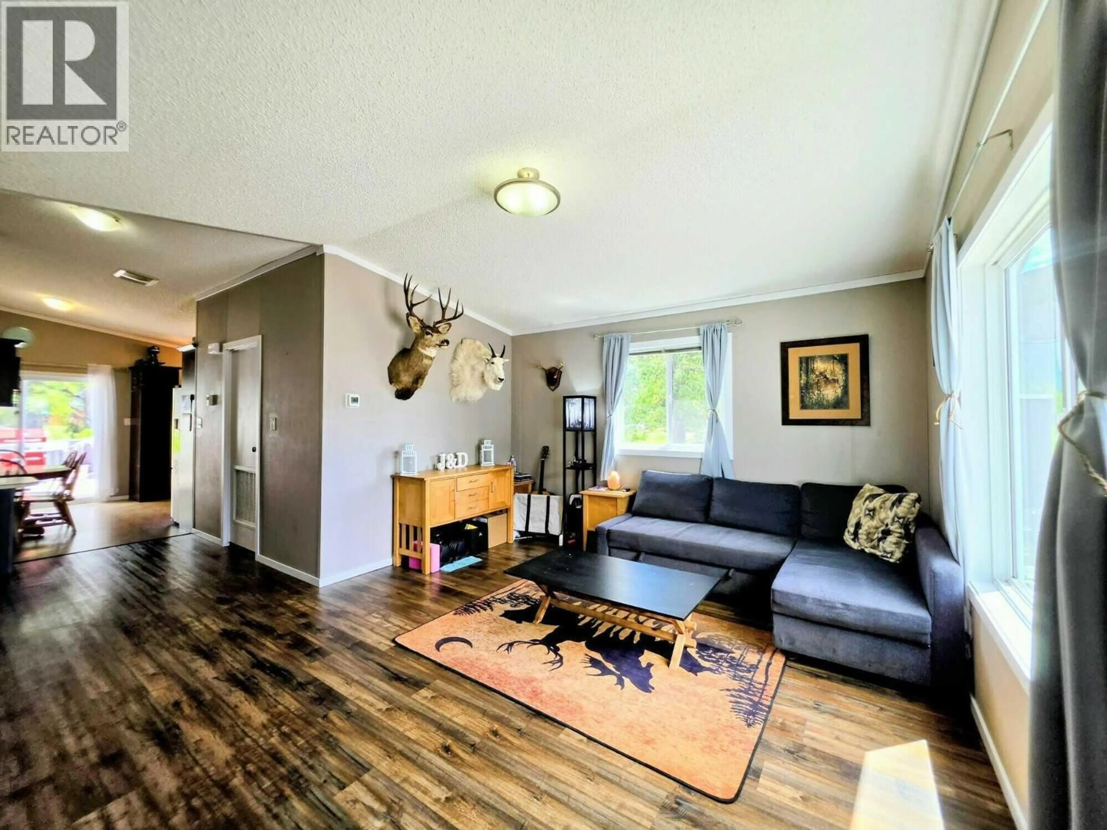 Living room with furniture, wood/laminate floor for 7 - 6210 LOWER ELK VALLEY ROAD, Sparwood British Columbia V0B2G3