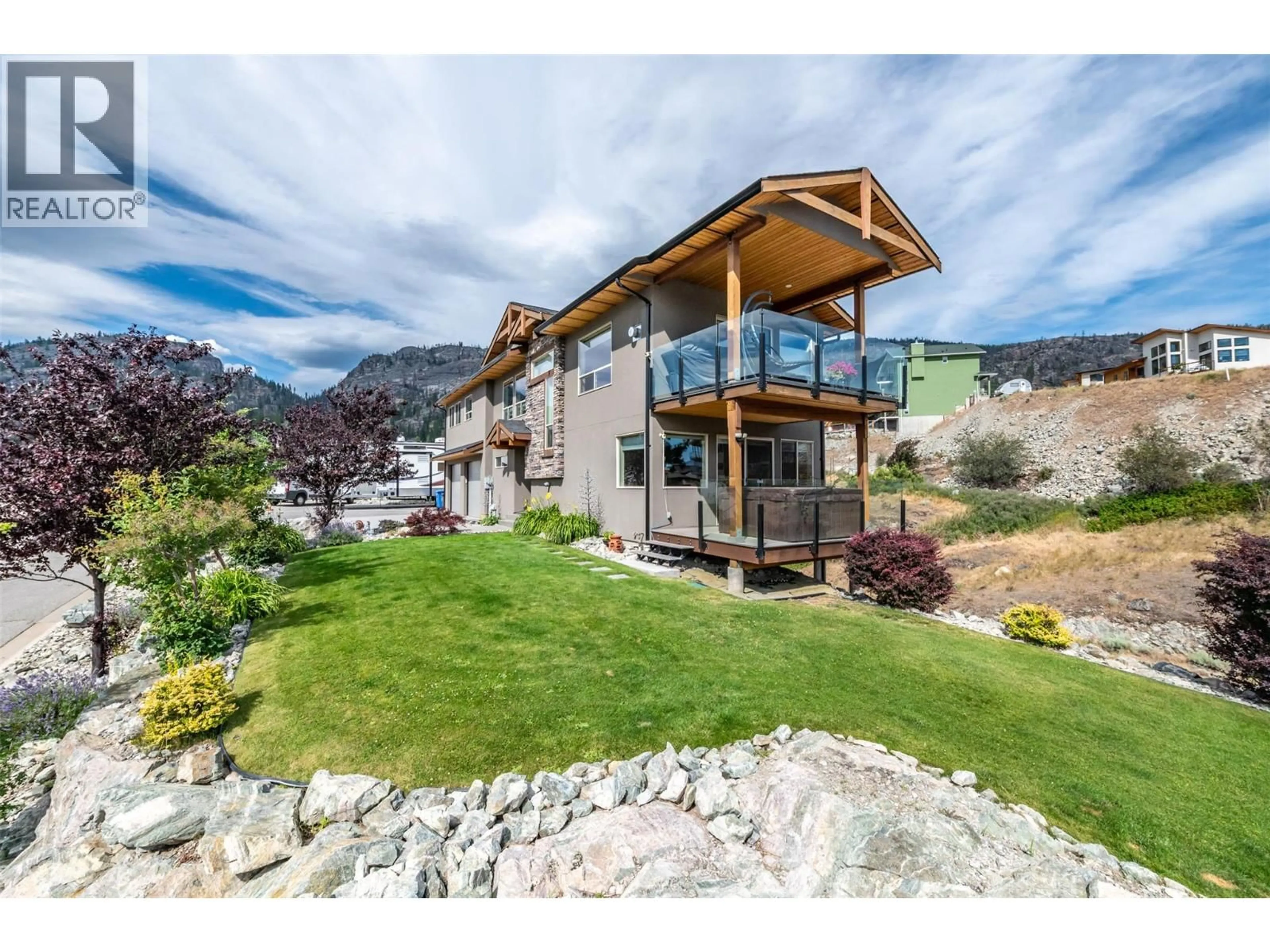 A pic from outside/outdoor area/front of a property/back of a property/a pic from drone, mountain view for 108 CHARDONNAY COURT, Okanagan Falls British Columbia V0H1R3