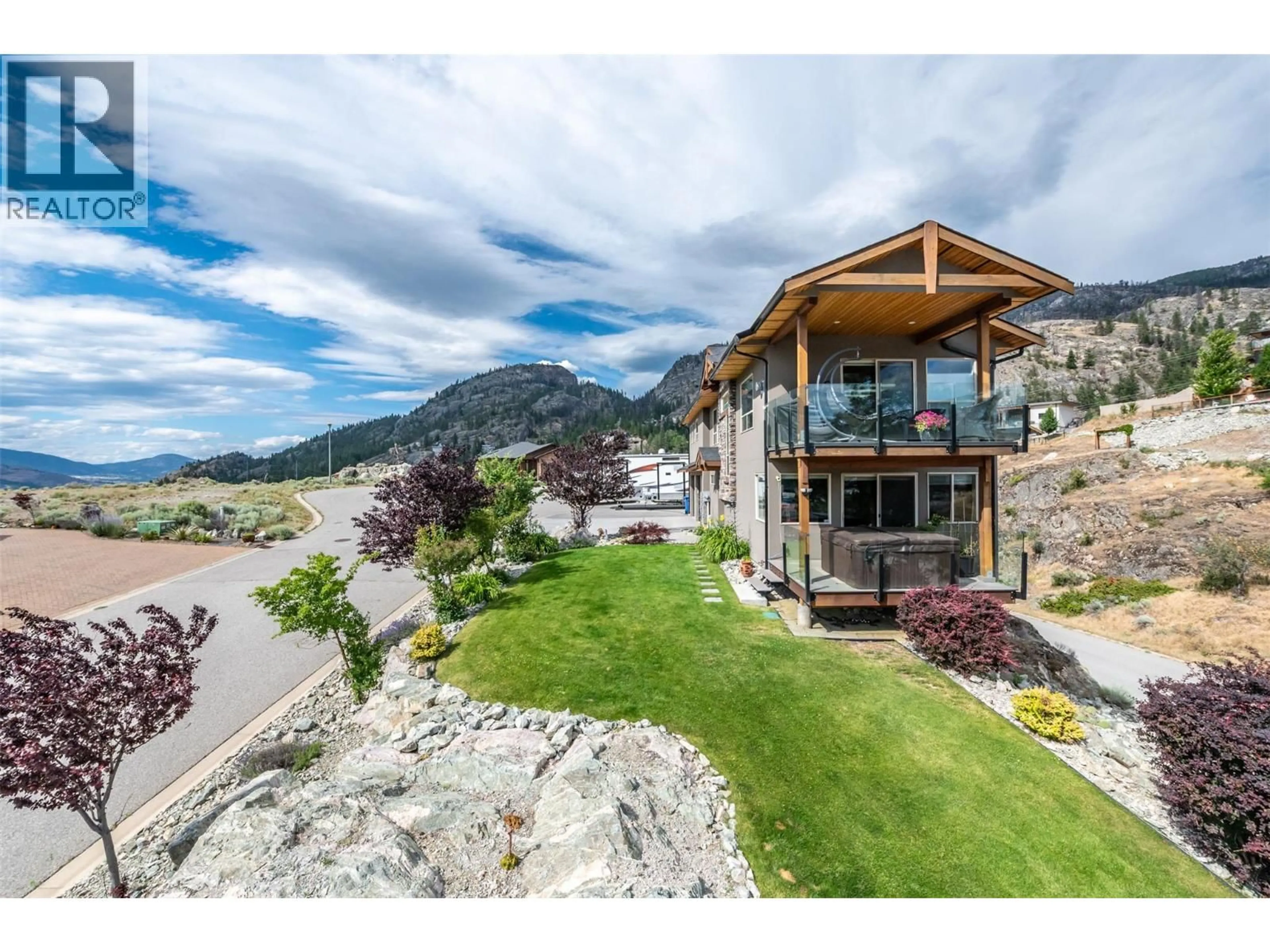 A pic from outside/outdoor area/front of a property/back of a property/a pic from drone, mountain view for 108 CHARDONNAY COURT, Okanagan Falls British Columbia V0H1R3
