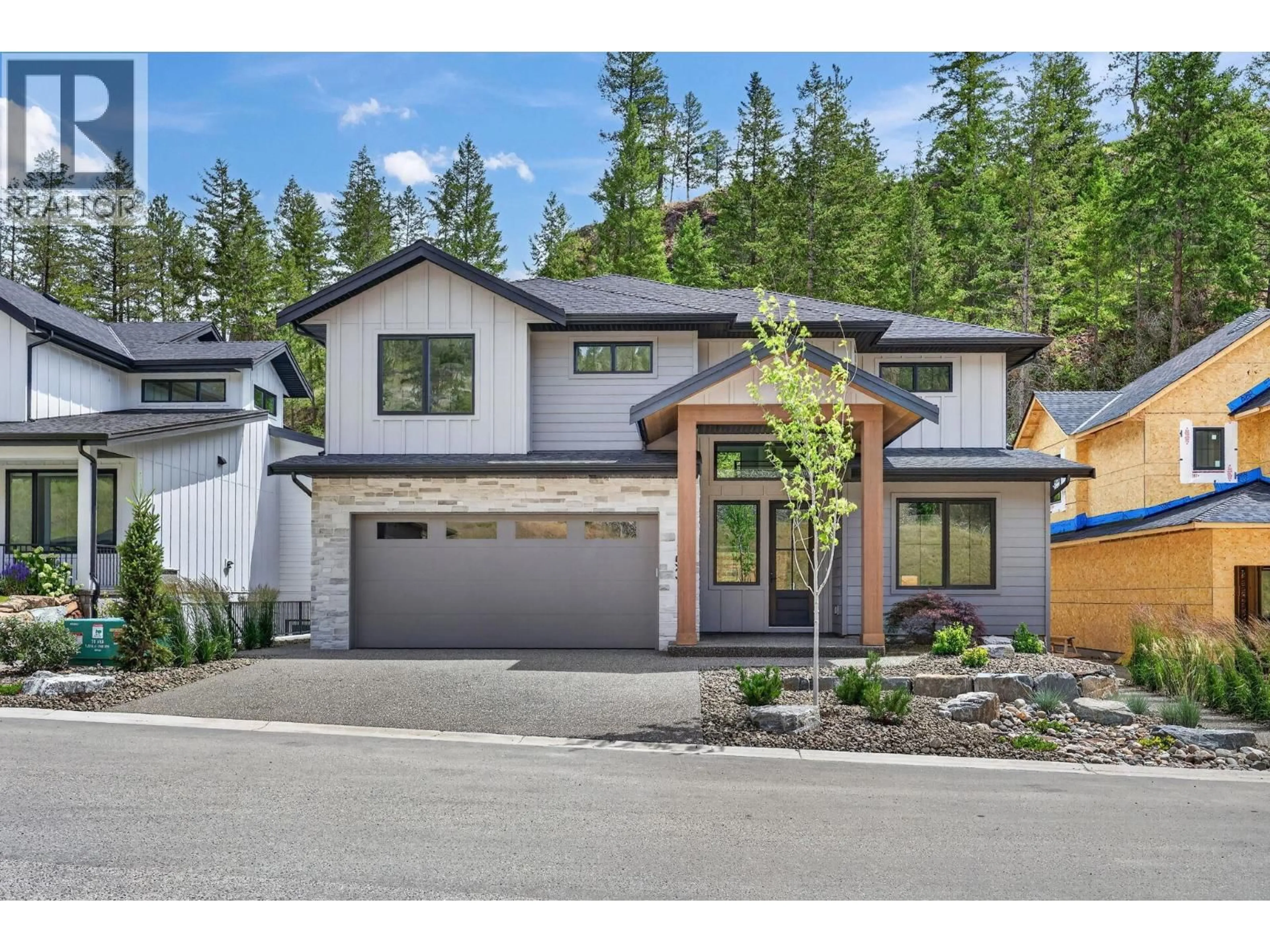 Home with brick exterior material, street for 1531 OLIVE POND PLACE, Kelowna British Columbia V1V2C6