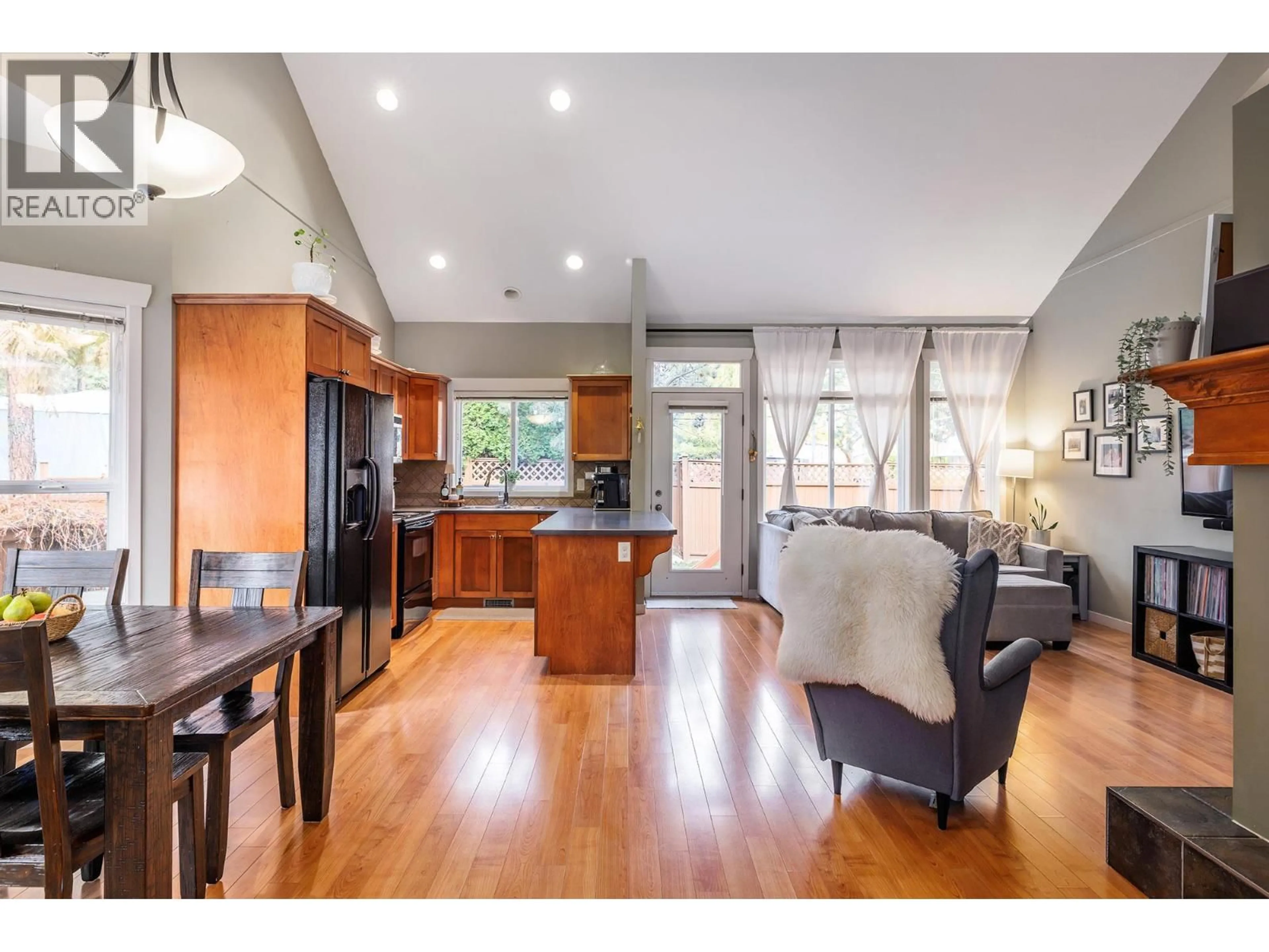 Open concept kitchen, wood/laminate floor for 10 - 1450 ROSE MEADOW DRIVE, West Kelowna British Columbia V1Z4A4