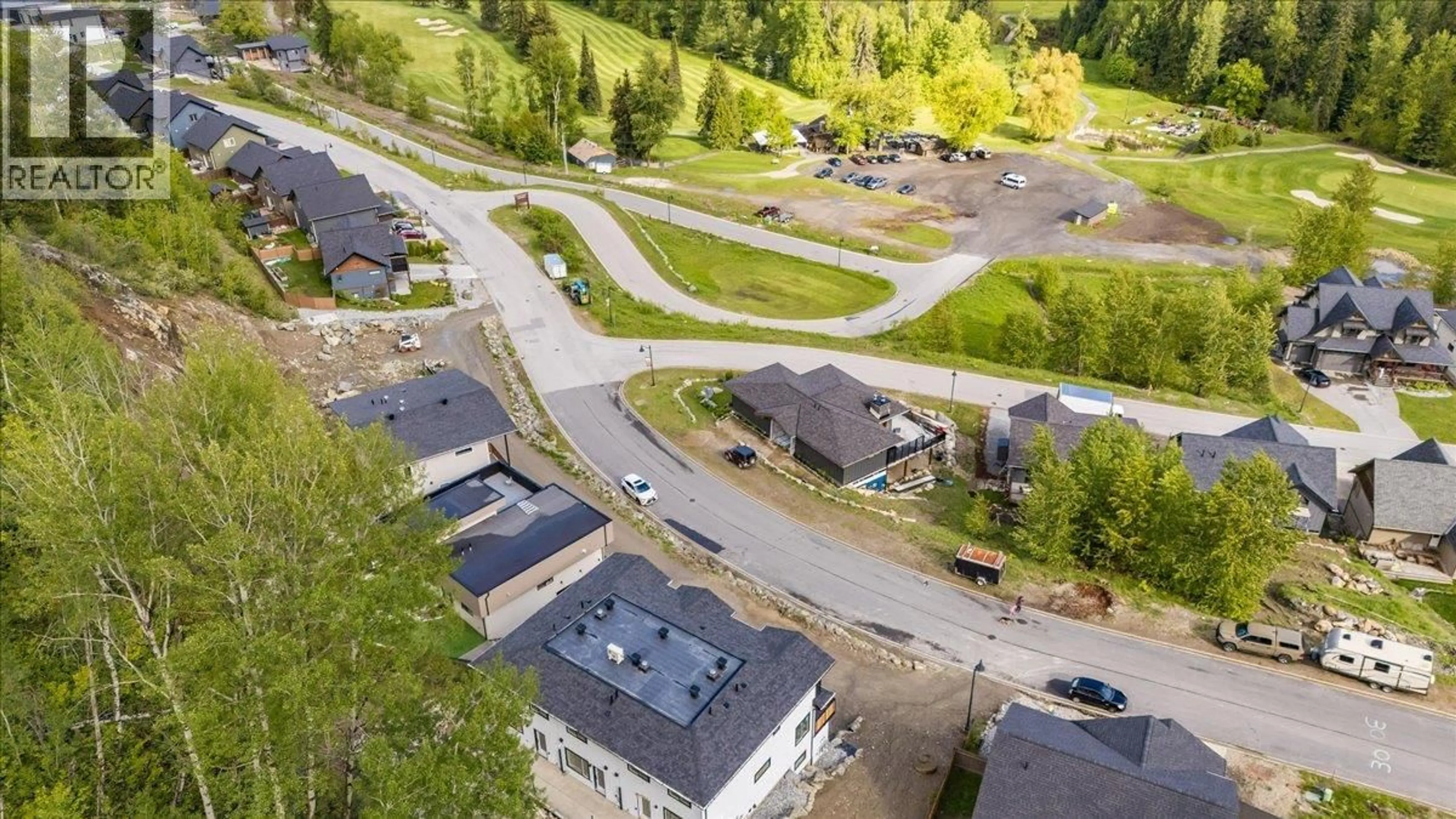 A pic from outside/outdoor area/front of a property/back of a property/a pic from drone, street for 932-2 REDSTONE DRIVE, Rossland British Columbia V0G1Y0