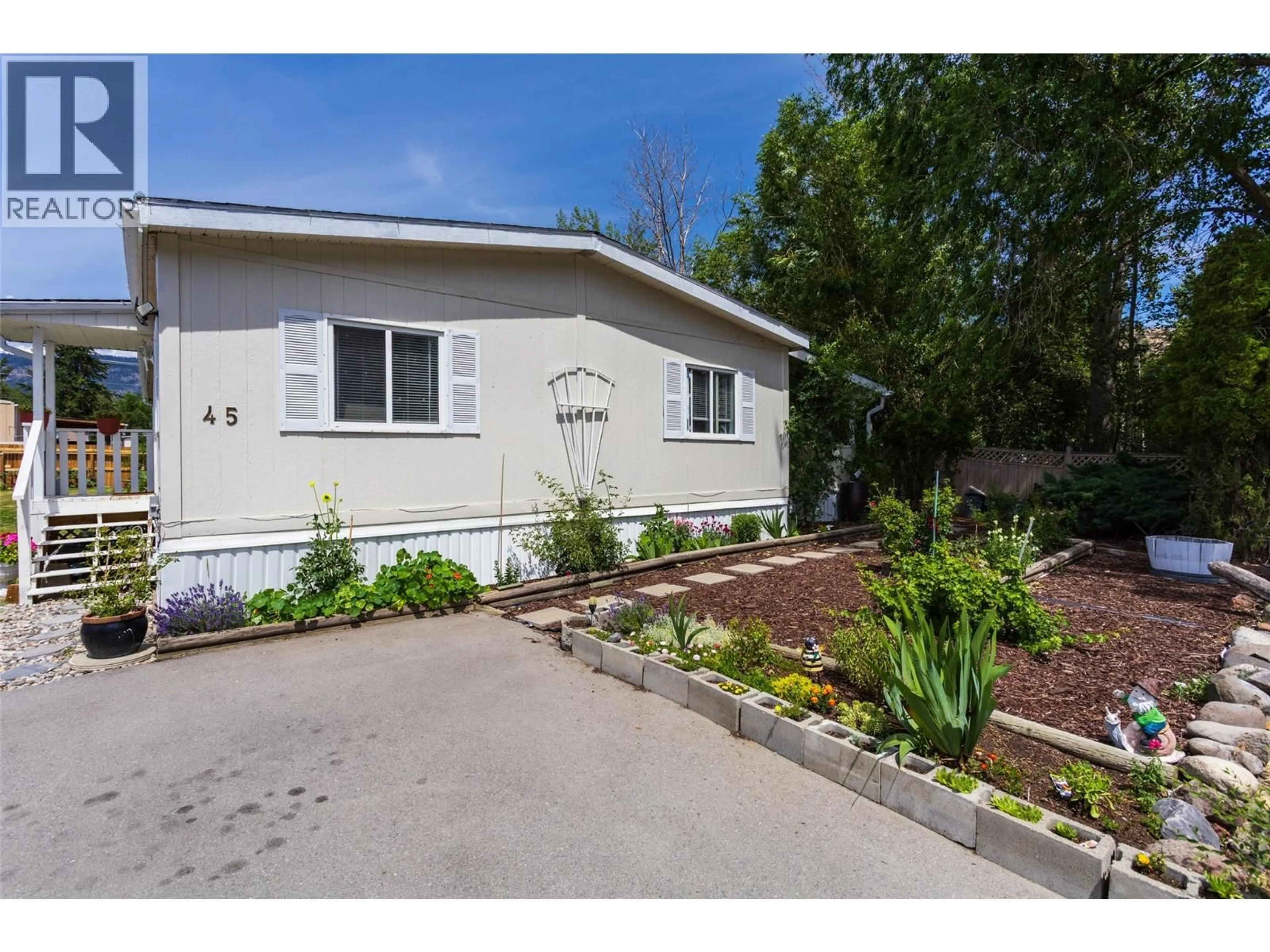 Home with vinyl exterior material, street for 45 - 1881 BOUCHERIE ROAD, West Kelowna British Columbia V4T0C9