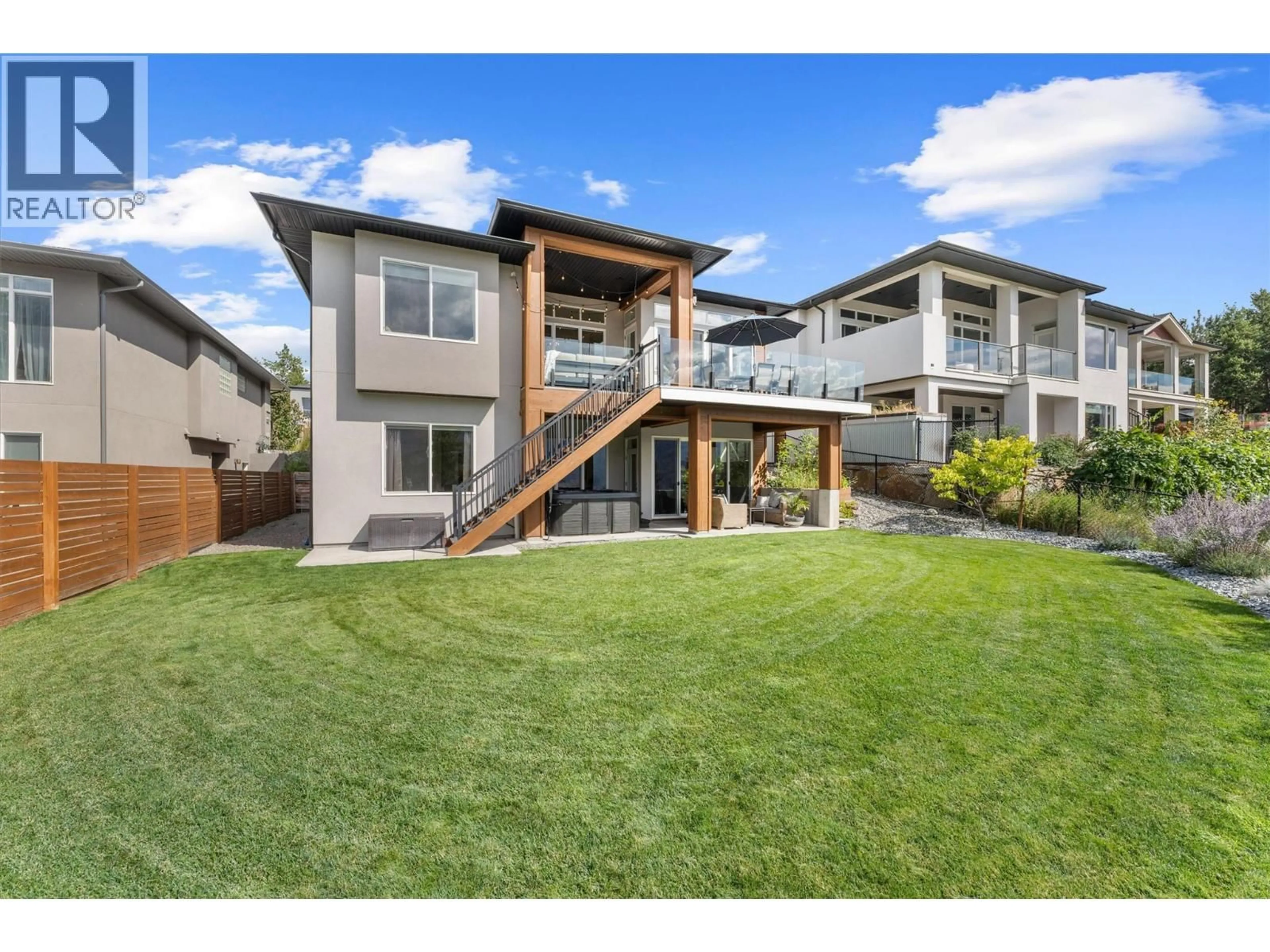 A pic from outside/outdoor area/front of a property/back of a property/a pic from drone, mountain view for 8510 HERITAGE DRIVE, Lake Country British Columbia V4V2W2