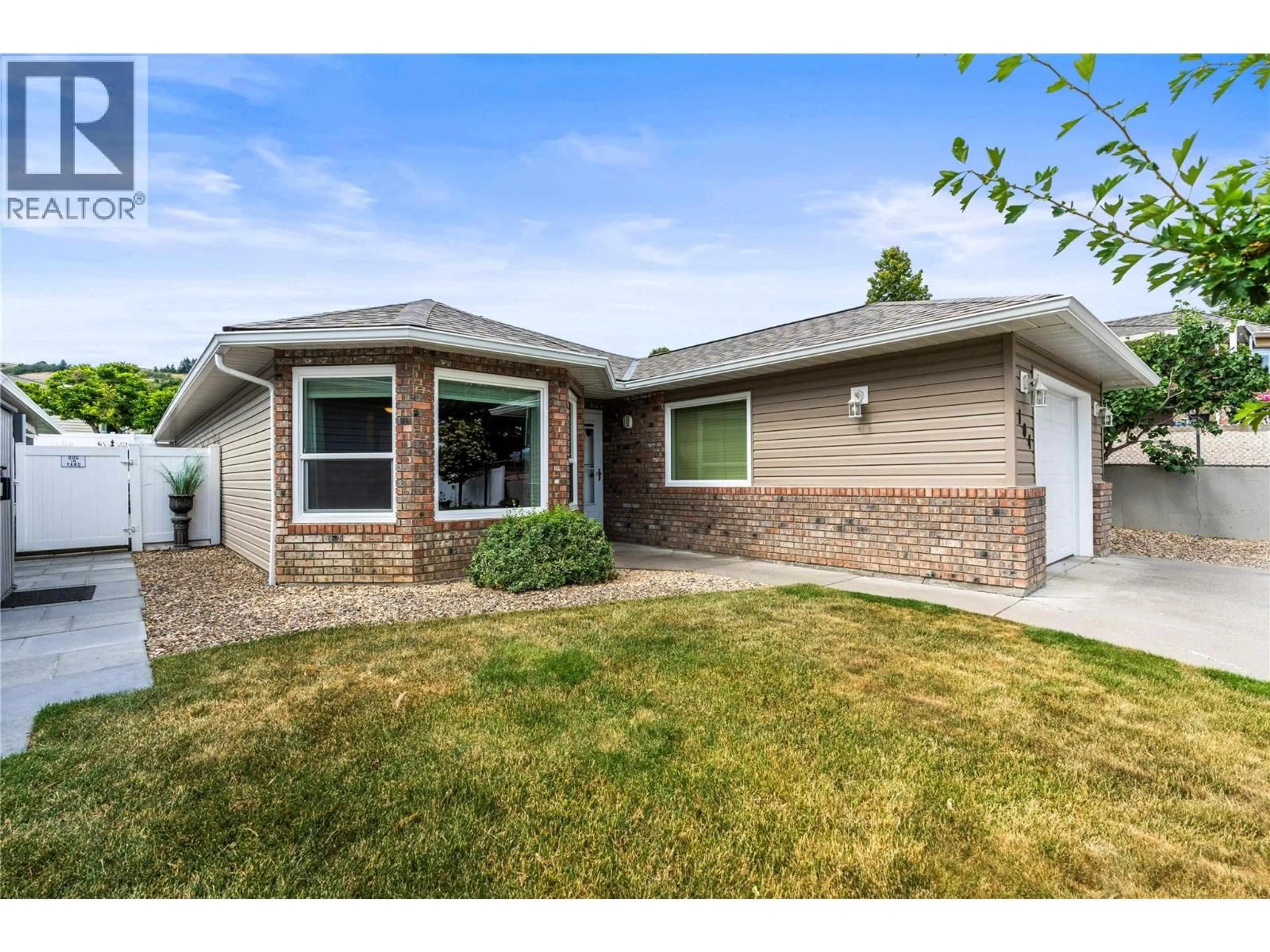 Home with vinyl exterior material, street for 104 - 1108 14 AVENUE, Vernon British Columbia V1B2S5
