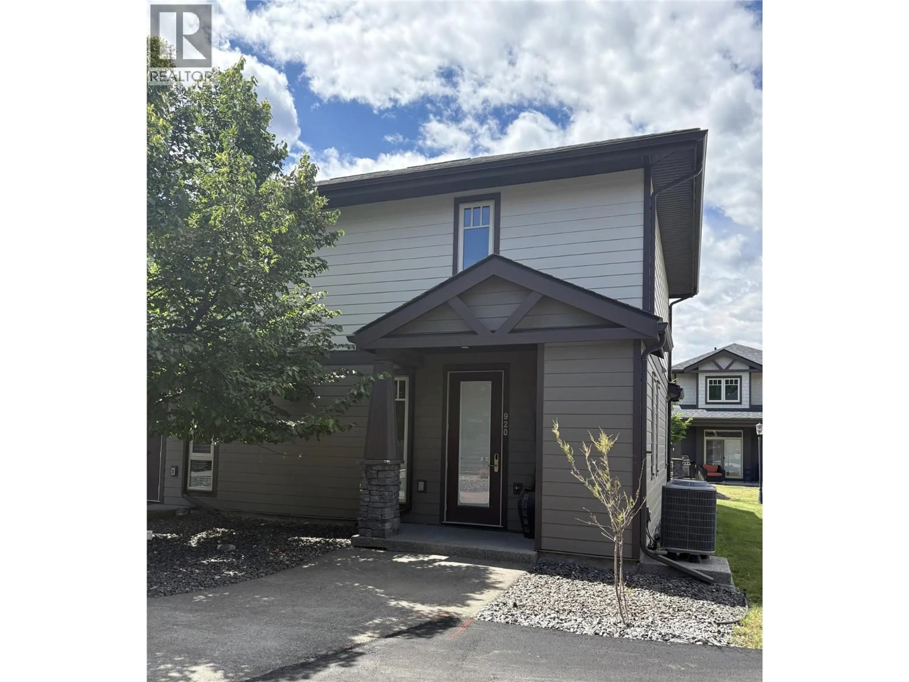Home with vinyl exterior material, street for 920 - 900 BIGHORN BOULEVARD, Radium Hot Springs British Columbia V0A1M0