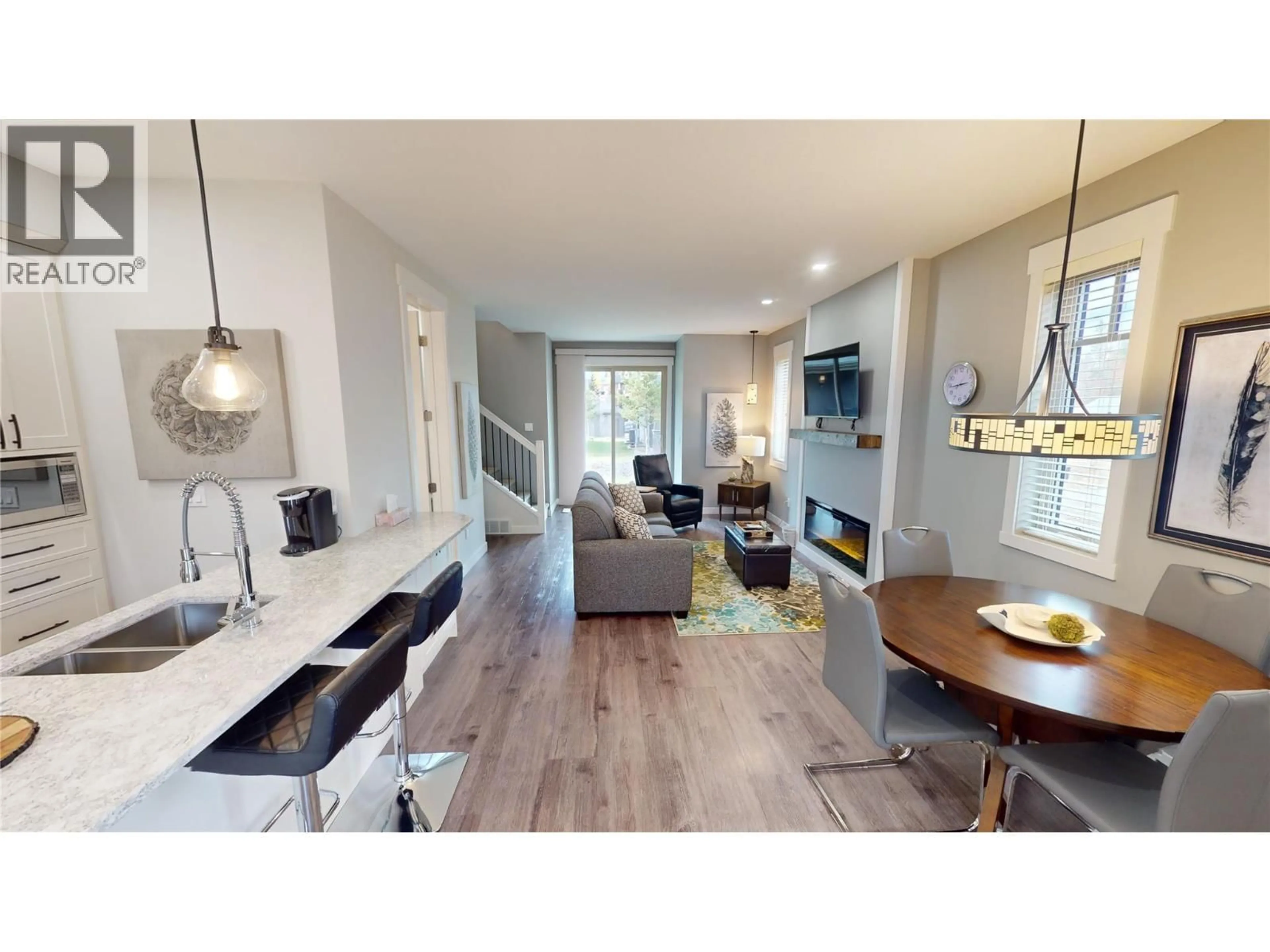 Open concept kitchen, wood/laminate floor for 920 - 900 BIGHORN BOULEVARD, Radium Hot Springs British Columbia V0A1M0