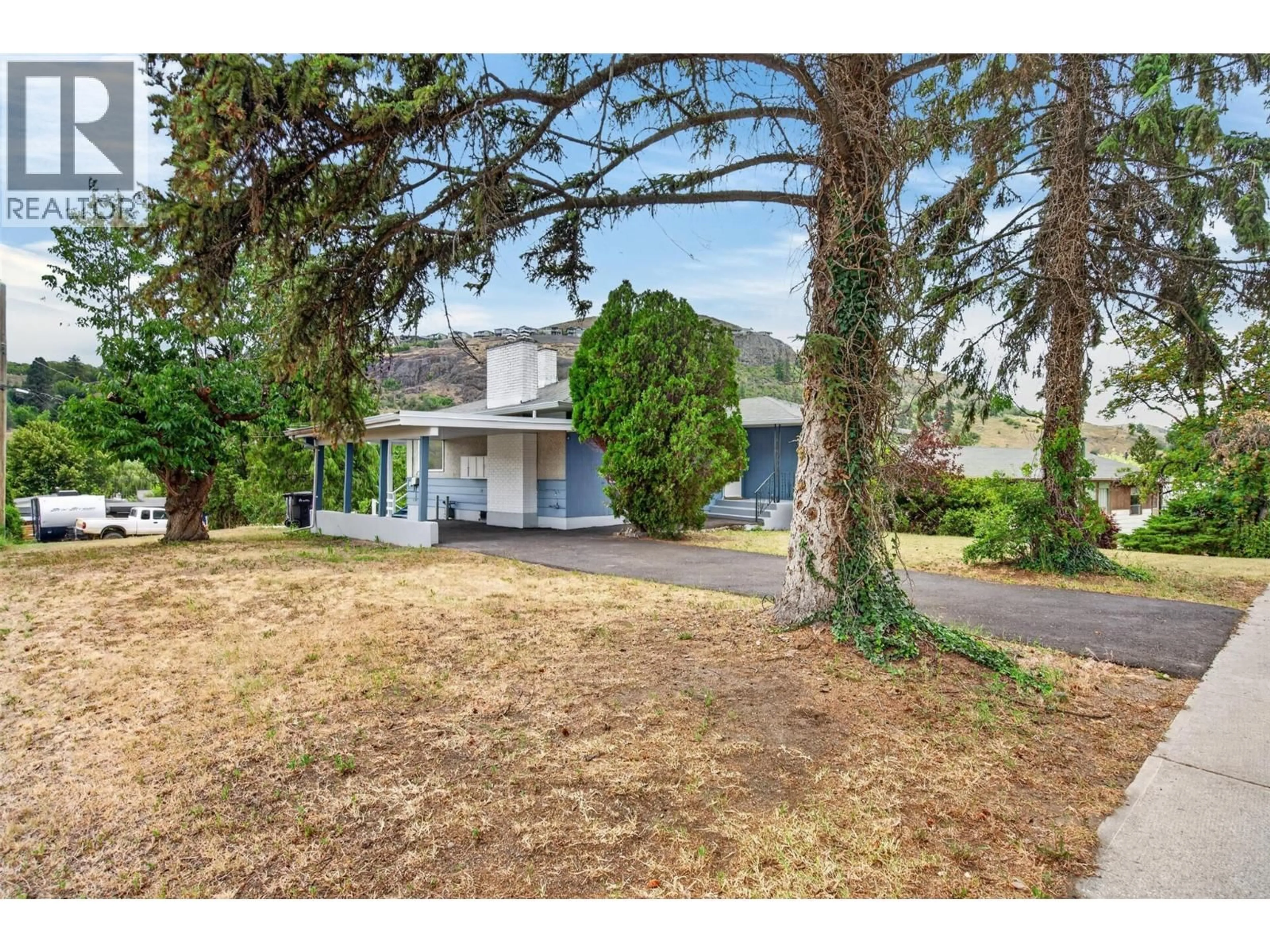 A pic from outside/outdoor area/front of a property/back of a property/a pic from drone, street for 3802 36 STREET, Vernon British Columbia V1T6E5