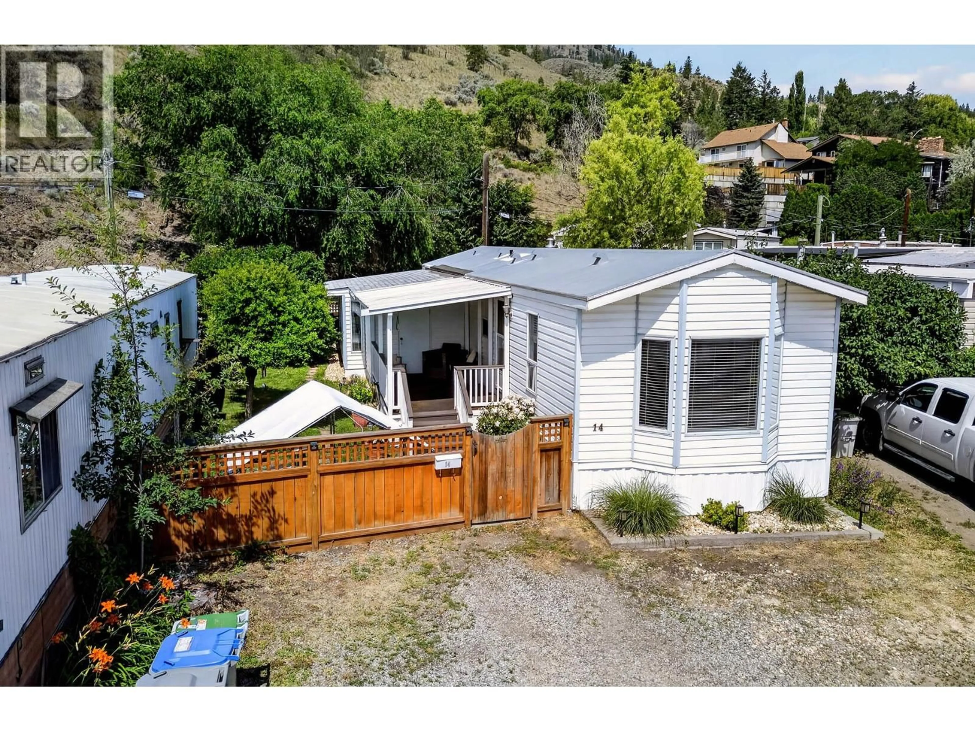 A pic from outside/outdoor area/front of a property/back of a property/a pic from drone, water/lake/river/ocean view for 14 - 2380 WESTSYDE ROAD, Kamloops British Columbia V2B7V4