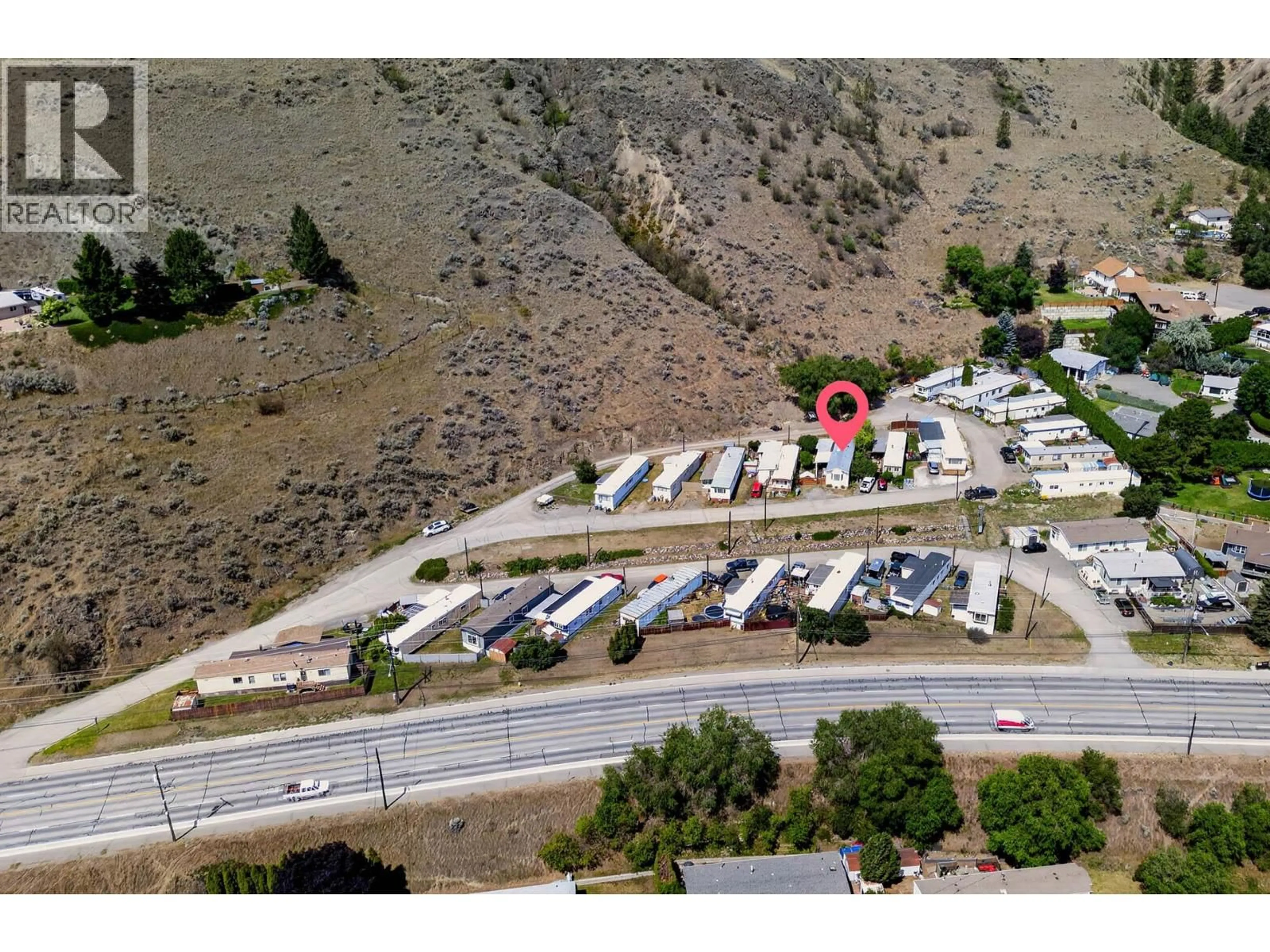 A pic from outside/outdoor area/front of a property/back of a property/a pic from drone, street for 14 - 2380 WESTSYDE ROAD, Kamloops British Columbia V2B7V4