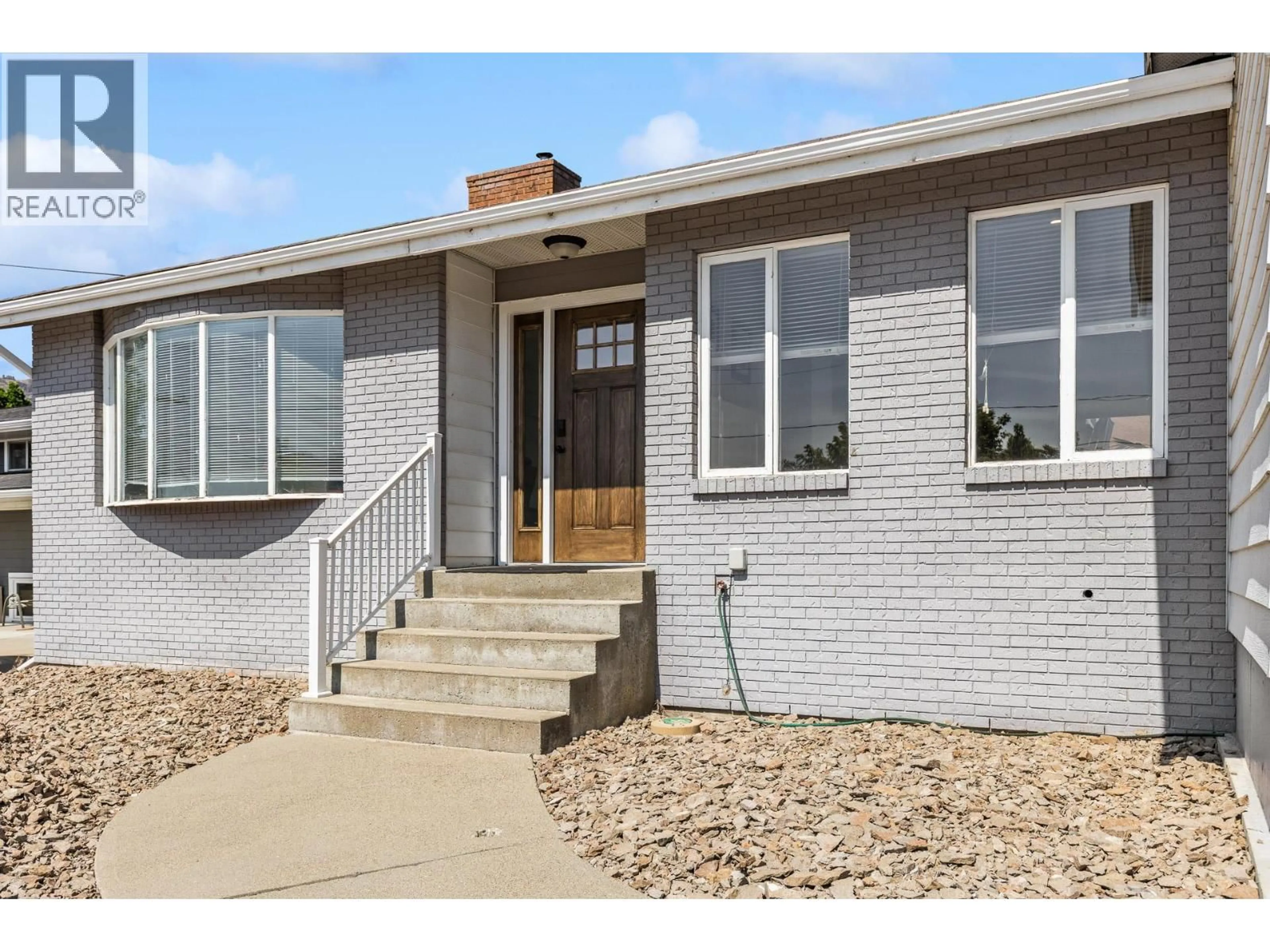 Home with brick exterior material, street for 14 QUAIL PLACE, Osoyoos British Columbia V0H1V1