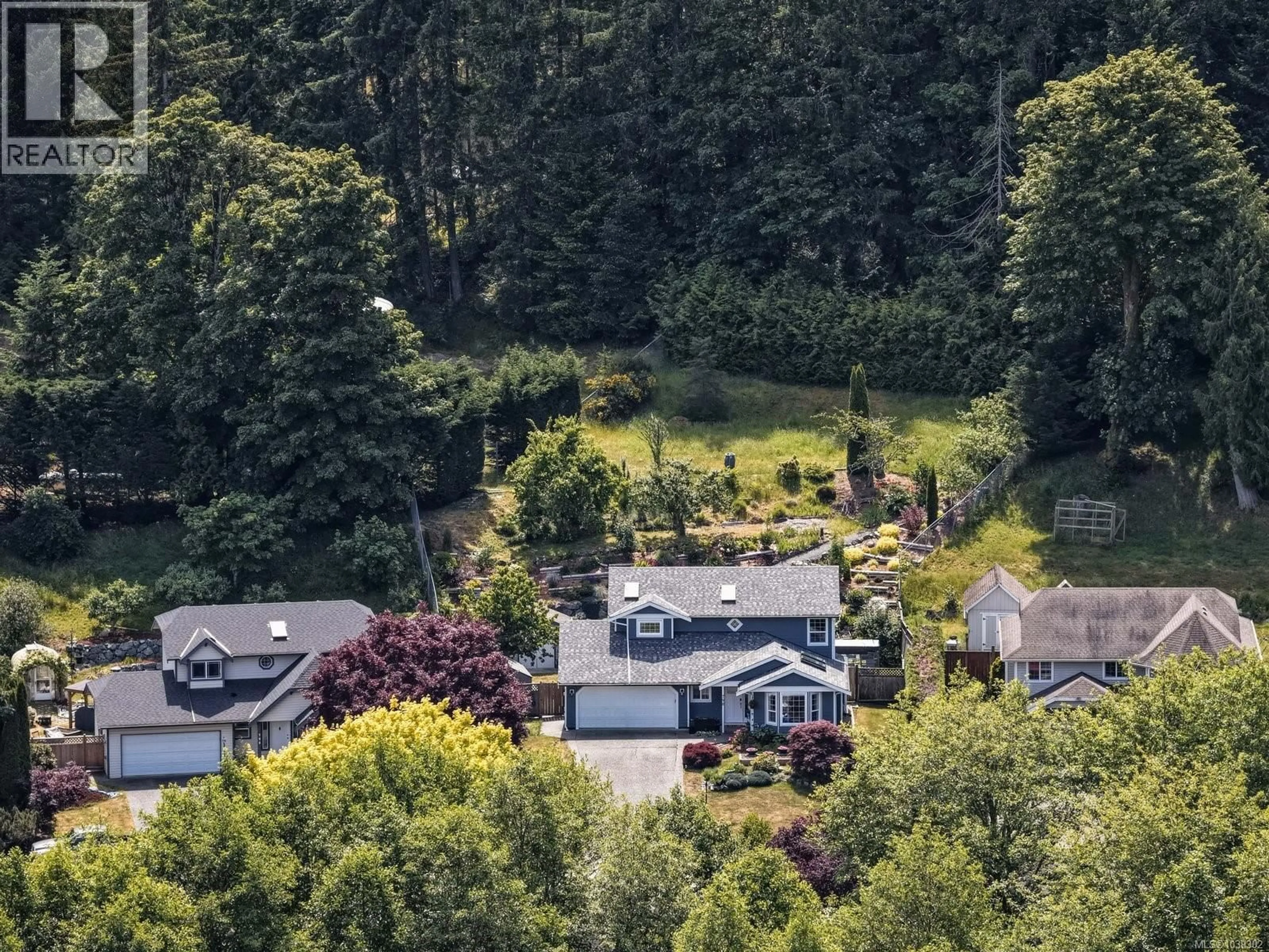 A pic from outside/outdoor area/front of a property/back of a property/a pic from drone, forest/trees view for 798 WINDSONG PLACE, Mill Bay British Columbia V0R2P4