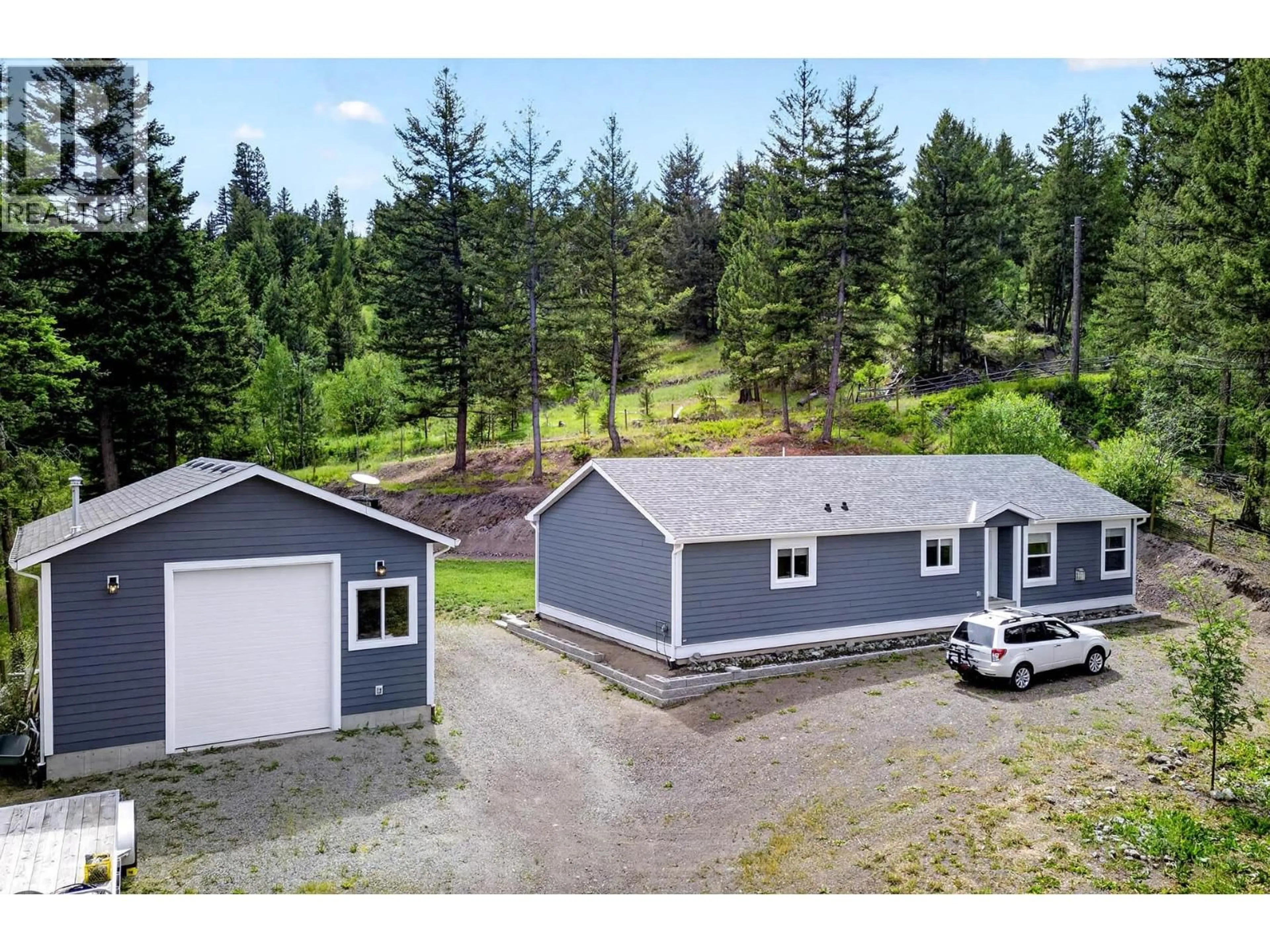 A pic from outside/outdoor area/front of a property/back of a property/a pic from drone, unknown for 393 WILD ROSE DRIVE, Merritt British Columbia V0K1Y0
