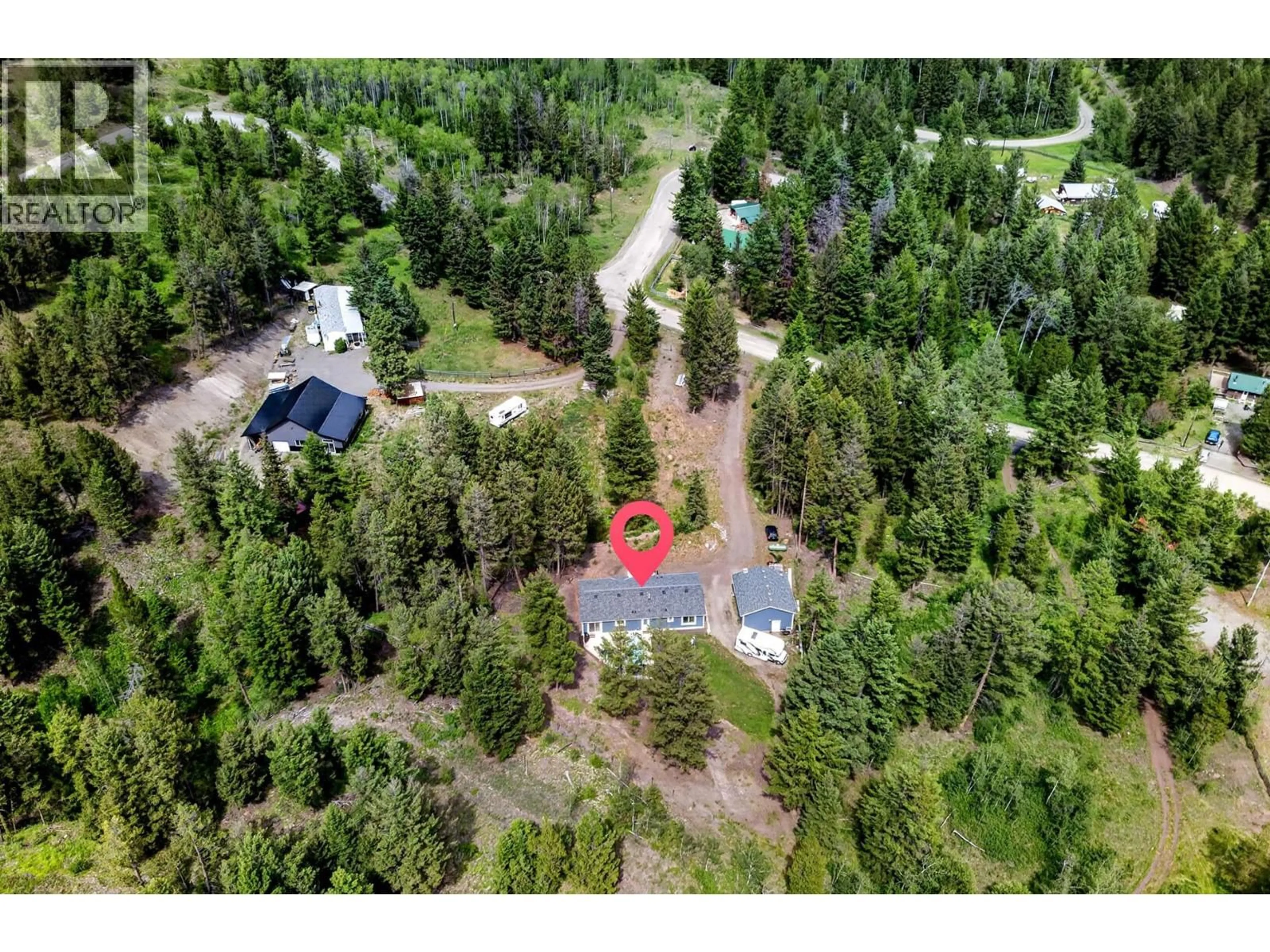A pic from outside/outdoor area/front of a property/back of a property/a pic from drone, forest/trees view for 393 WILD ROSE DRIVE, Merritt British Columbia V0K1Y0