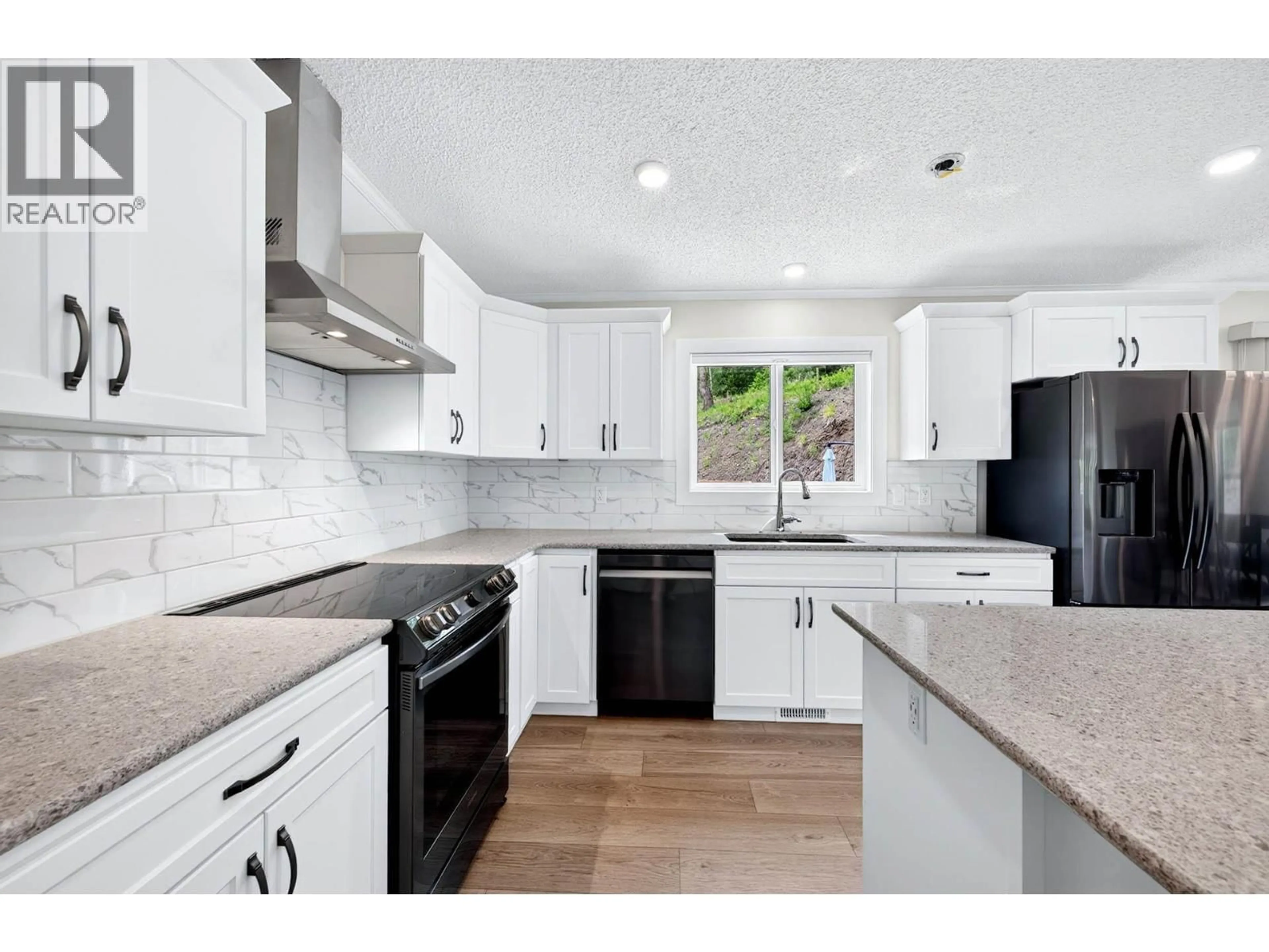 Open concept kitchen, unknown for 393 WILD ROSE DRIVE, Merritt British Columbia V0K1Y0