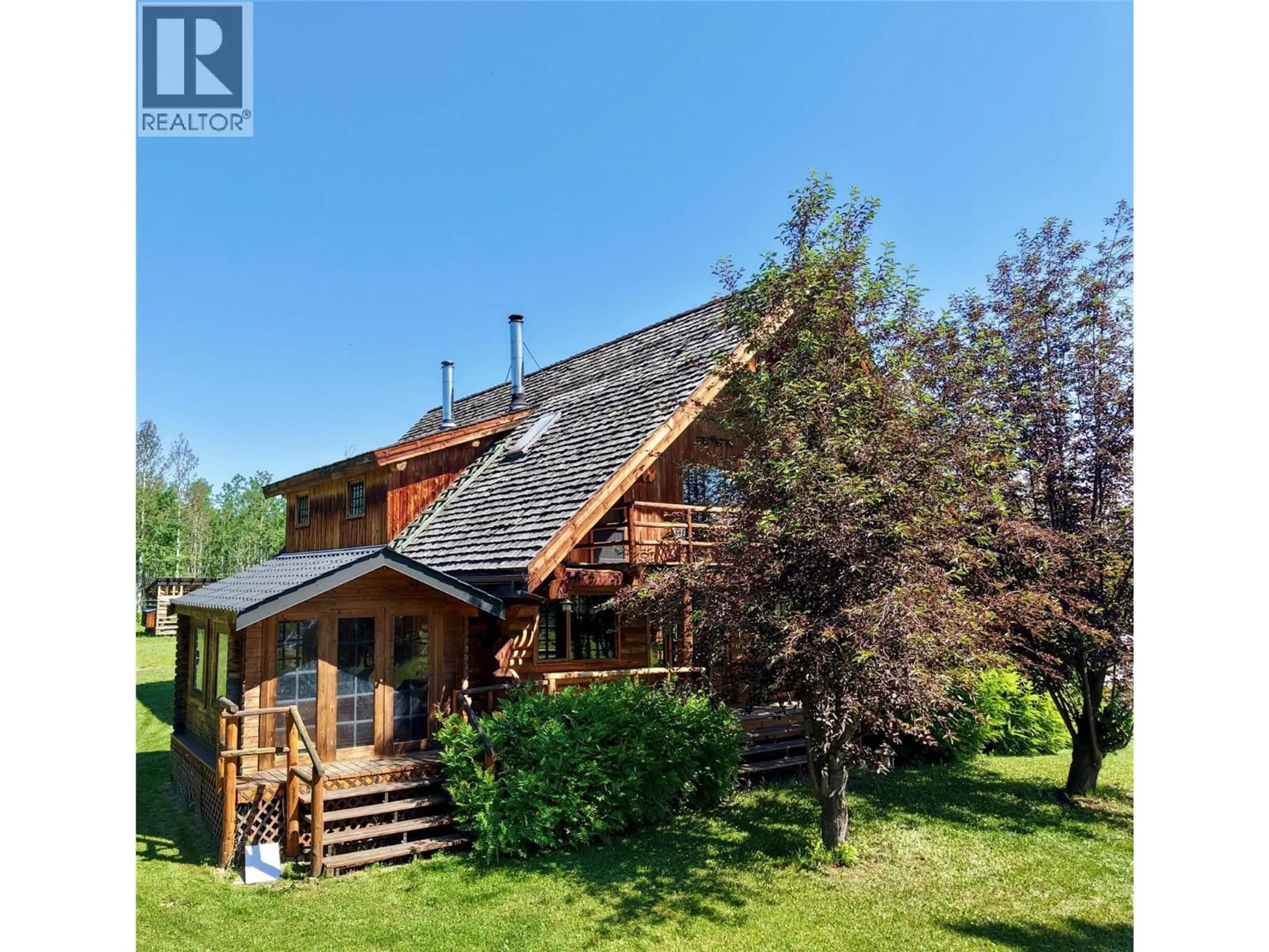 A pic from outside/outdoor area/front of a property/back of a property/a pic from drone, building for 9843 231 ROAD, Dawson Creek British Columbia V0C1B0