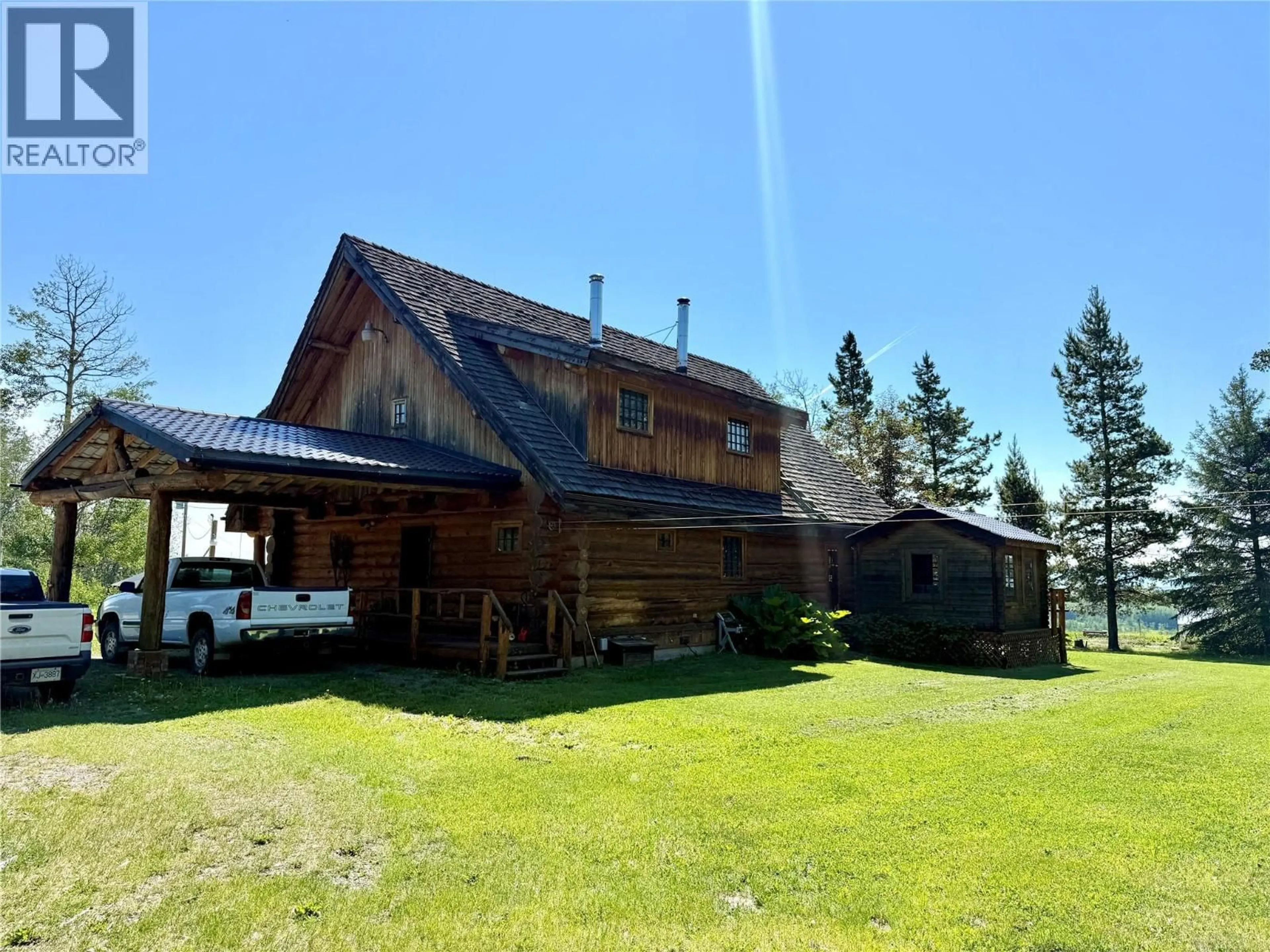 A pic from outside/outdoor area/front of a property/back of a property/a pic from drone, building for 9843 231 ROAD, Dawson Creek British Columbia V0C1B0