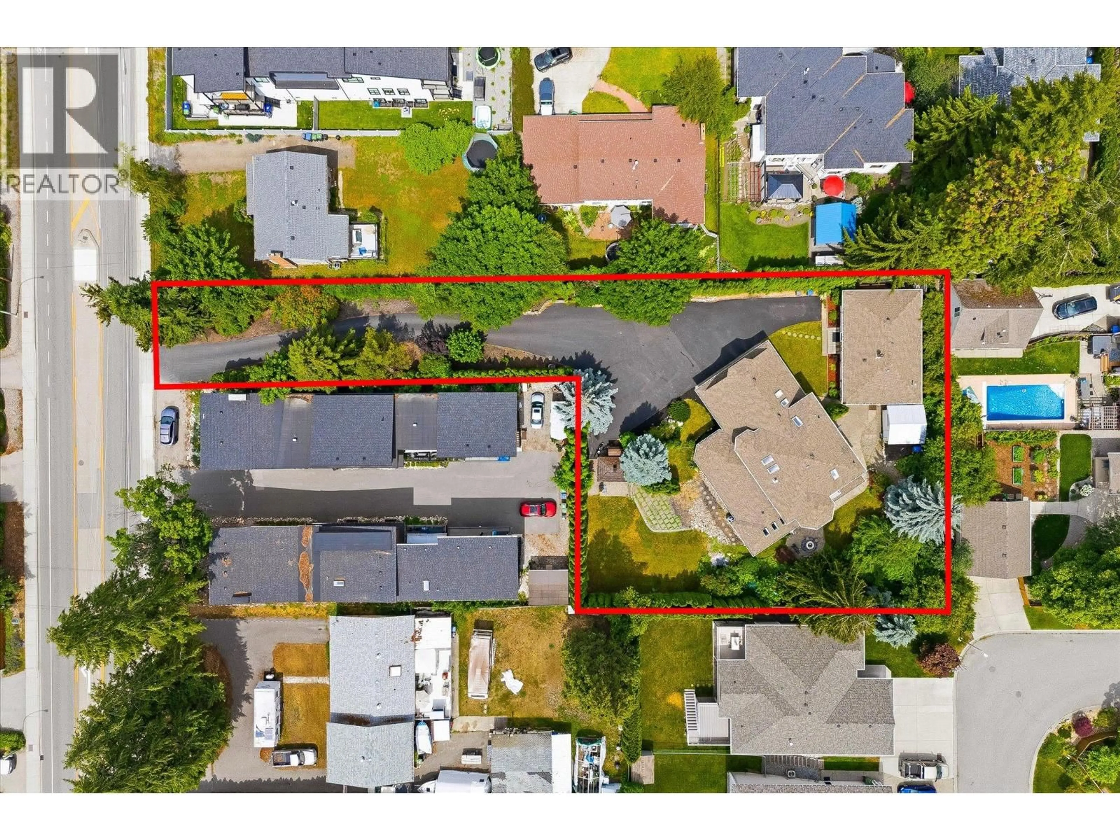 A pic from outside/outdoor area/front of a property/back of a property/a pic from drone, street for 4619 GORDON DRIVE, Kelowna British Columbia V1W1T5