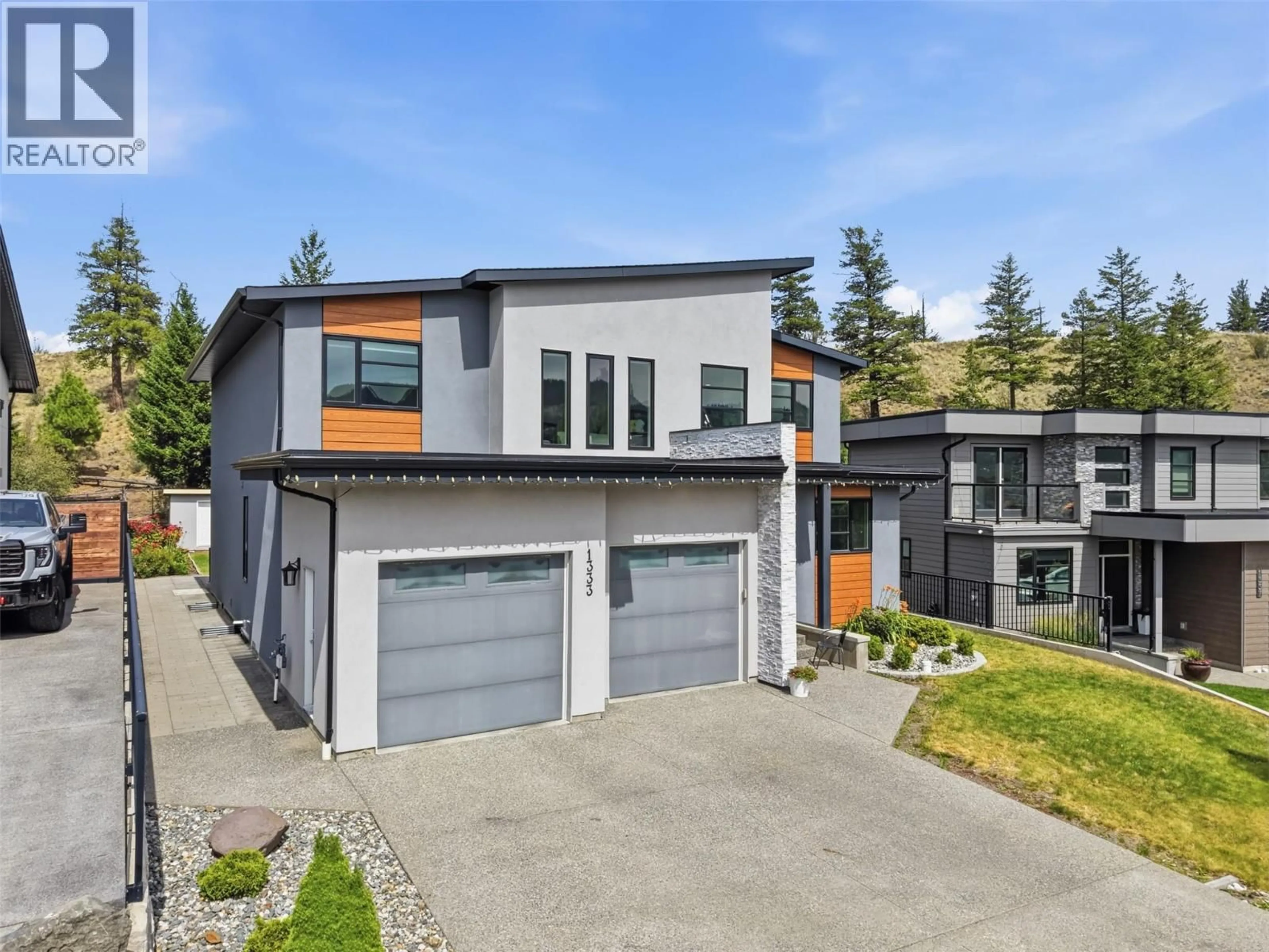 Home with vinyl exterior material, street for 1333 PRAIRIE ROSE DRIVE, Kamloops British Columbia V2E0C5