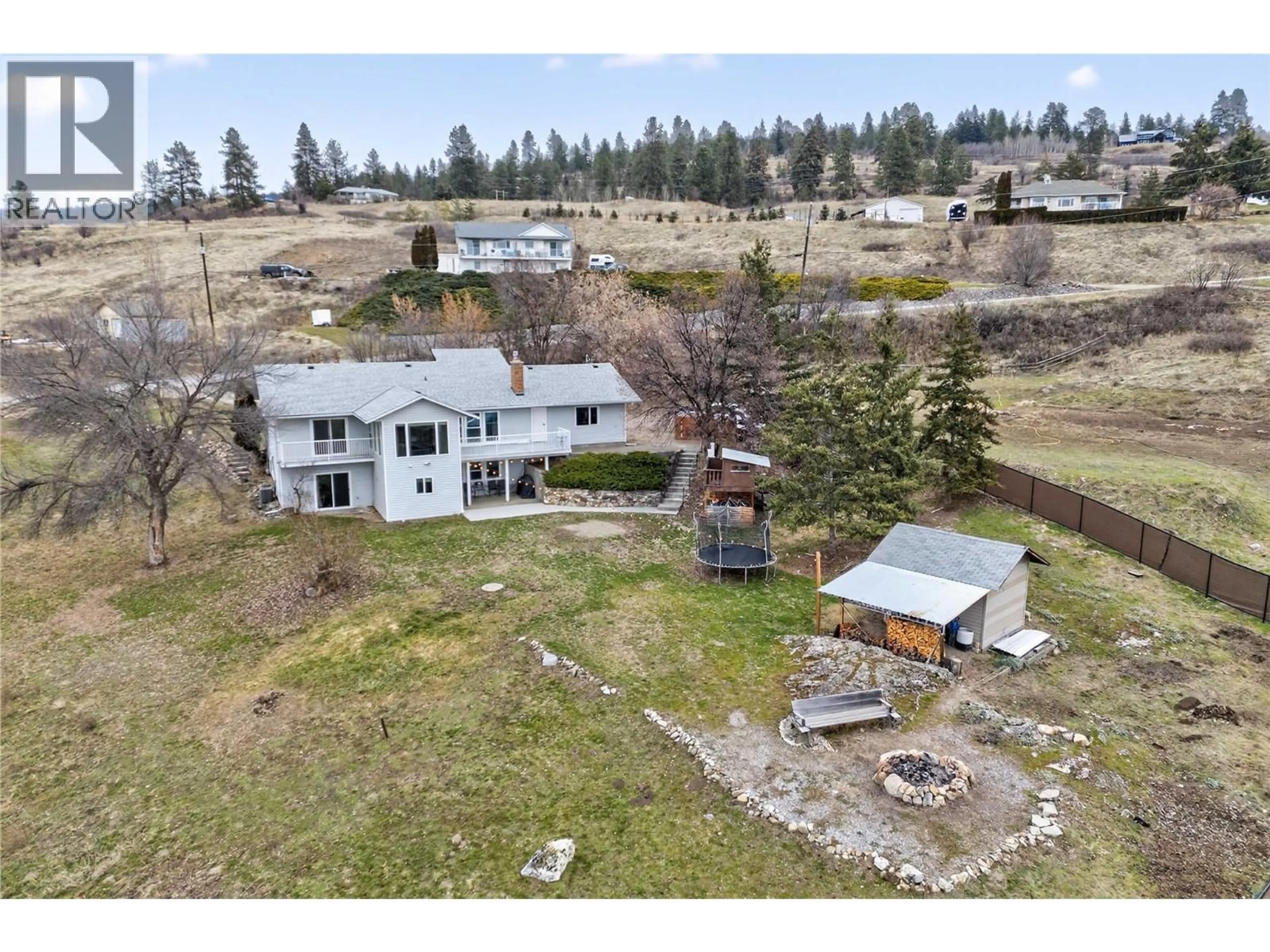 A pic from outside/outdoor area/front of a property/back of a property/a pic from drone, unknown for 7292 MOUNTRIDGE ROAD, Vernon British Columbia V1B3S8