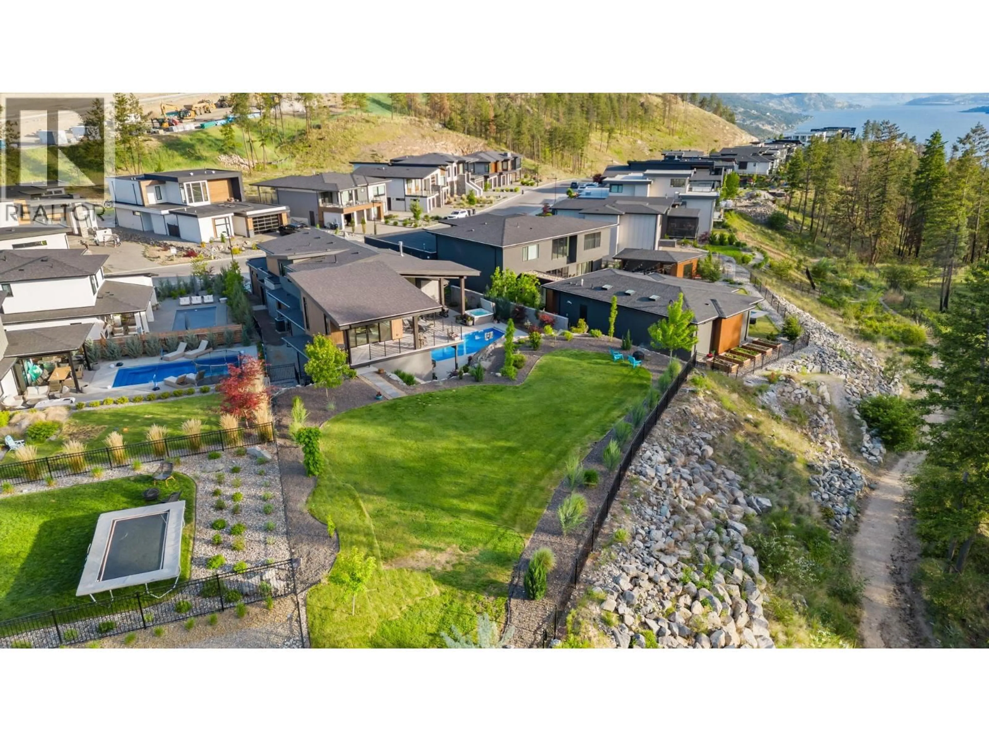 A pic from outside/outdoor area/front of a property/back of a property/a pic from drone, mountain view for 10258 BEACON HILL DRIVE, Lake Country British Columbia V4V0A9