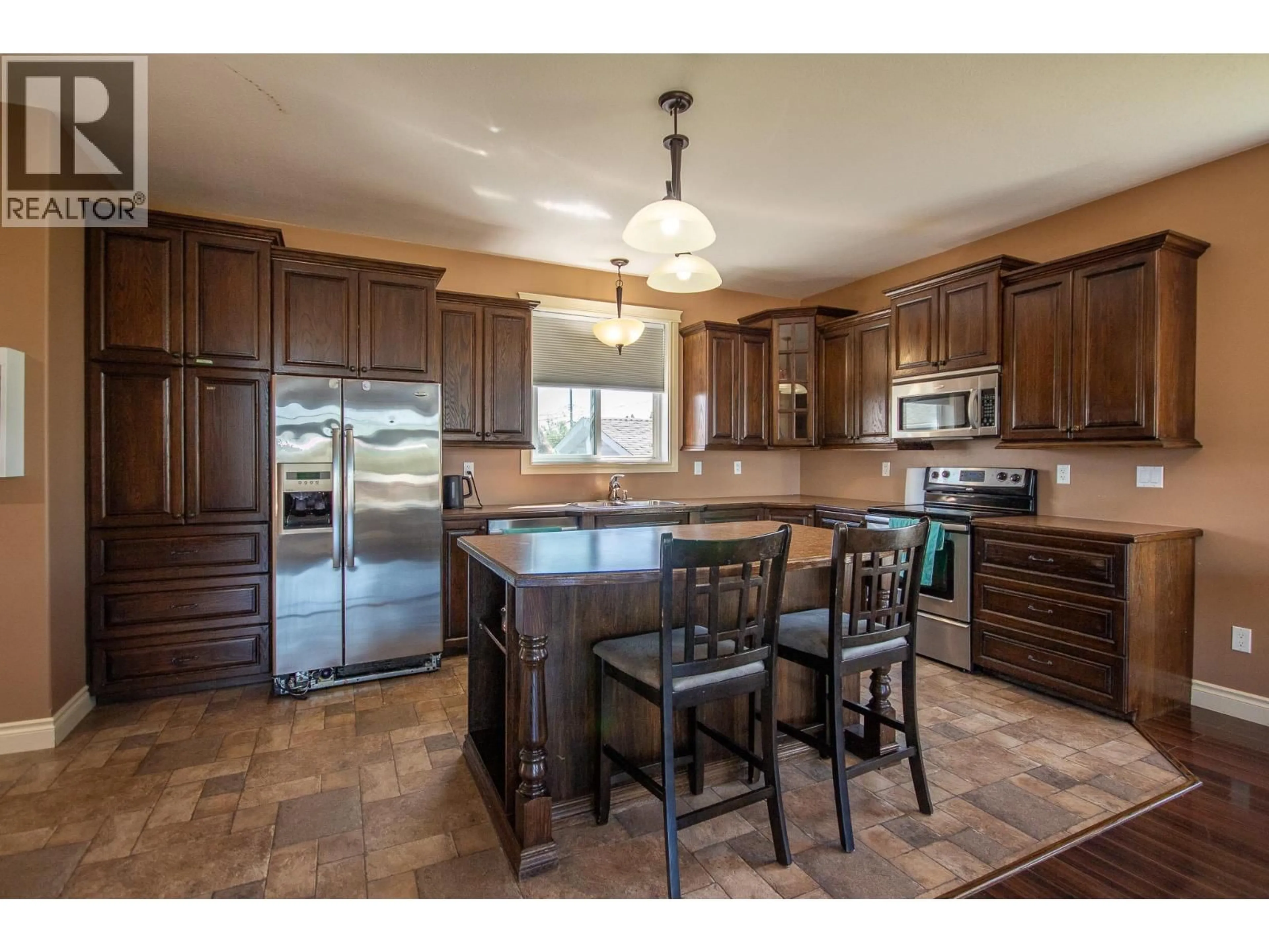 Open concept kitchen, ceramic/tile floor for 12000 11 STREET, Dawson Creek British Columbia V1G3J8