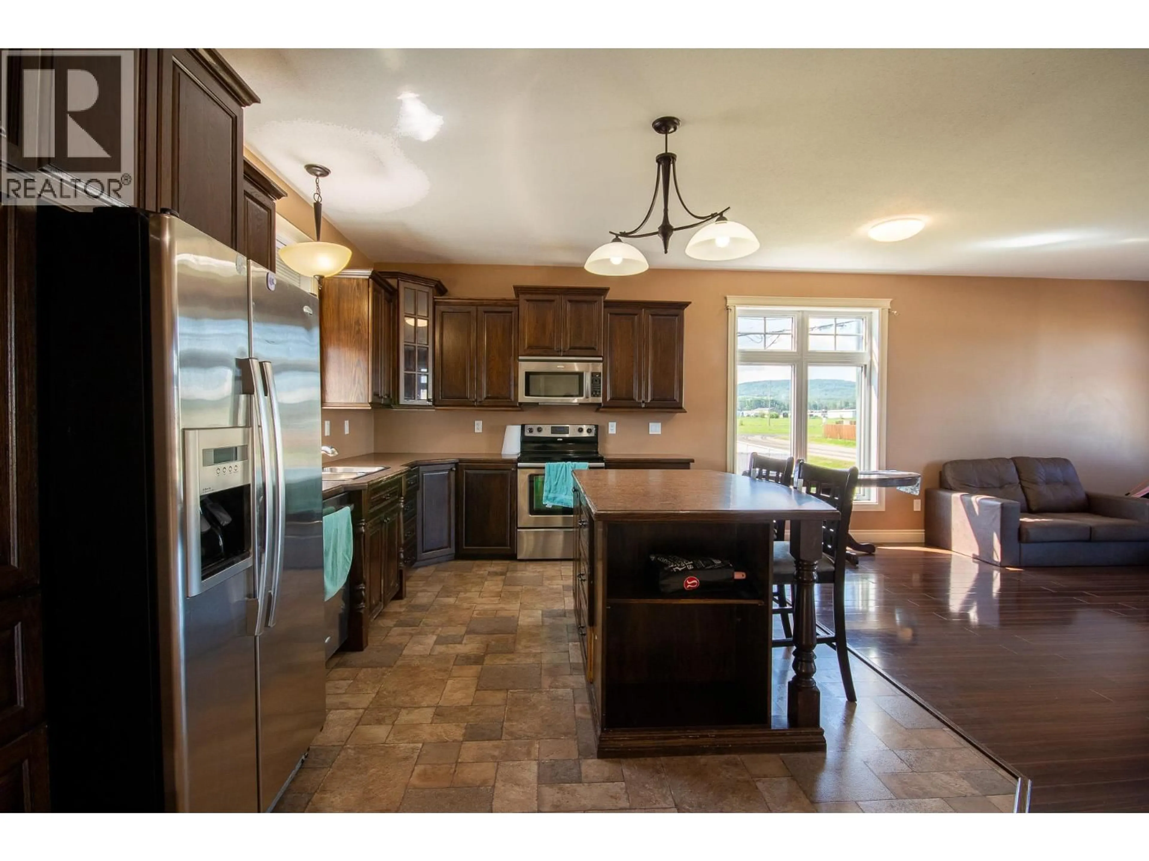 Open concept kitchen, ceramic/tile floor for 12000 11 STREET, Dawson Creek British Columbia V1G3J8