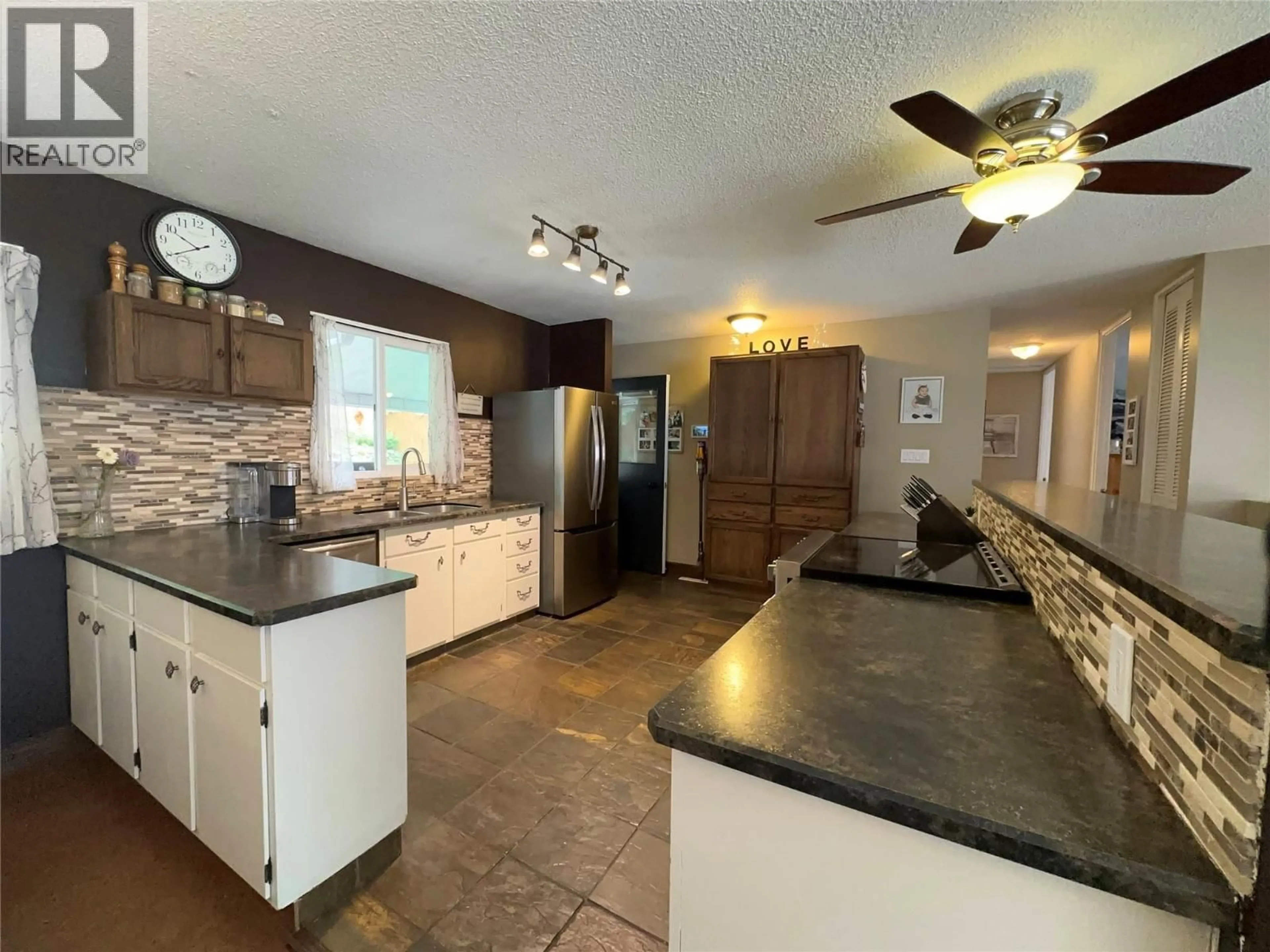Open concept kitchen, ceramic/tile floor for 3551 HIGHWAY DRIVE, Trail British Columbia V1R2T9
