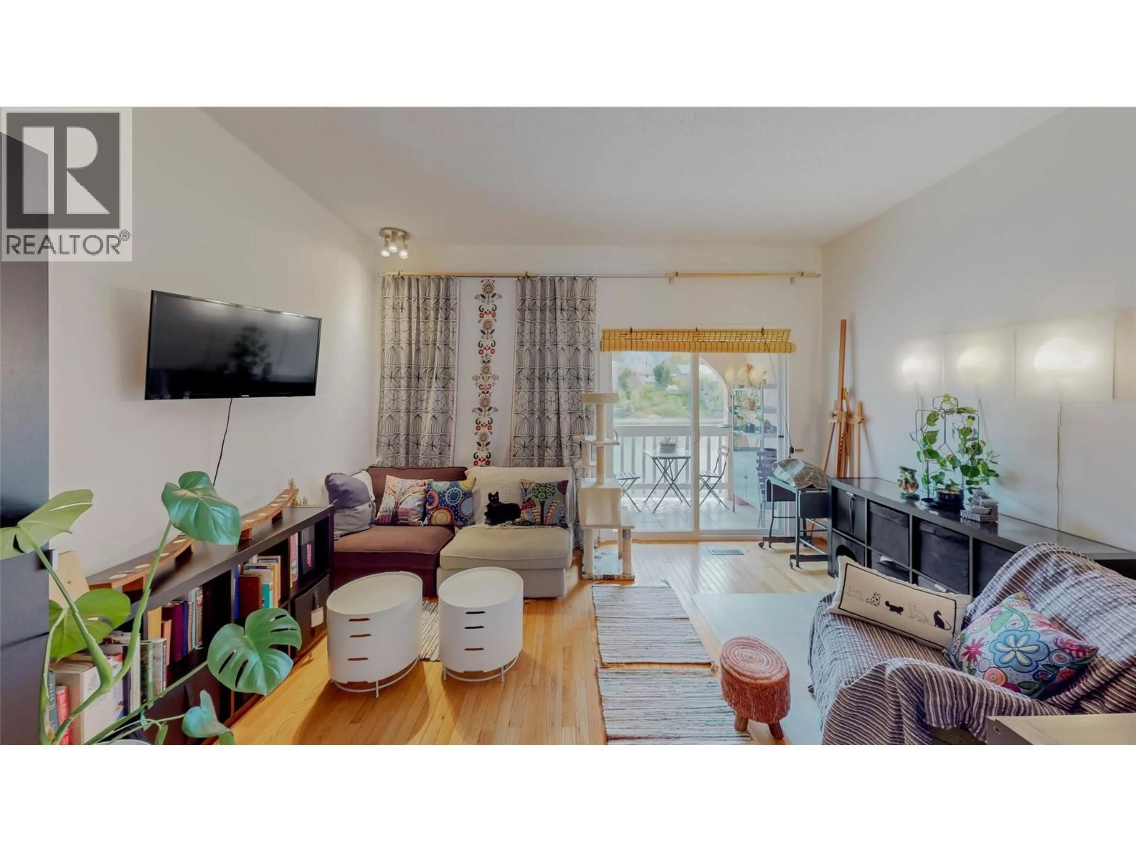 Living room with furniture, unknown for 8029 VEDETTE DRIVE, Osoyoos British Columbia V0H1V2