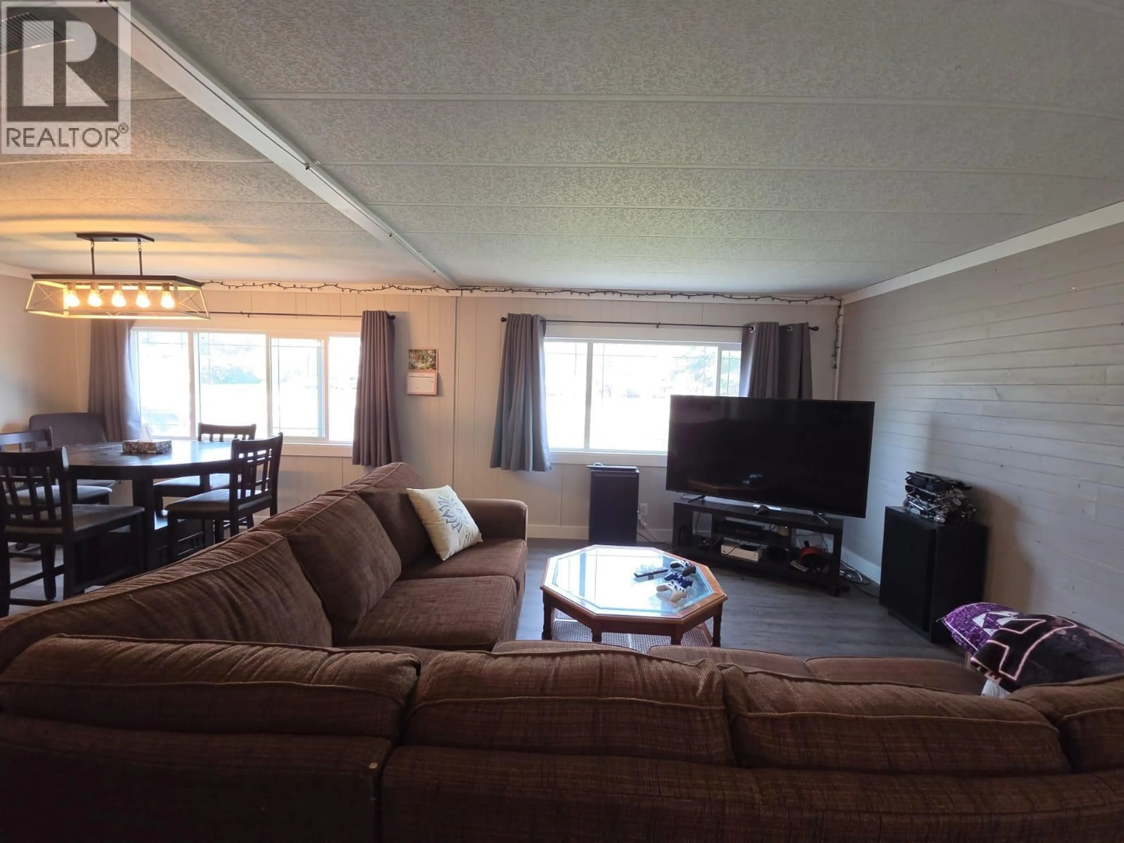 Living room with furniture, unknown for 5117 43 STREET NORTHEAST, Chetwynd British Columbia V0C1J0