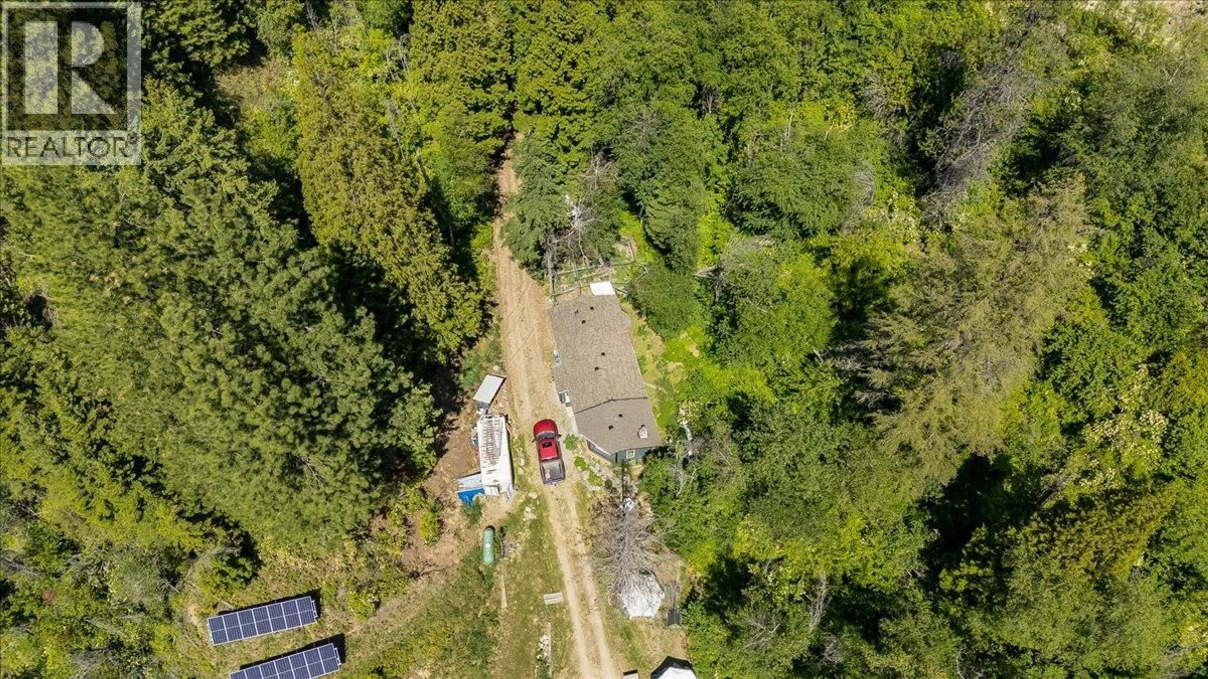 A pic from outside/outdoor area/front of a property/back of a property/a pic from drone, forest/trees view for 1385 PASS CREEK ROAD, Castlegar British Columbia V1N4S2