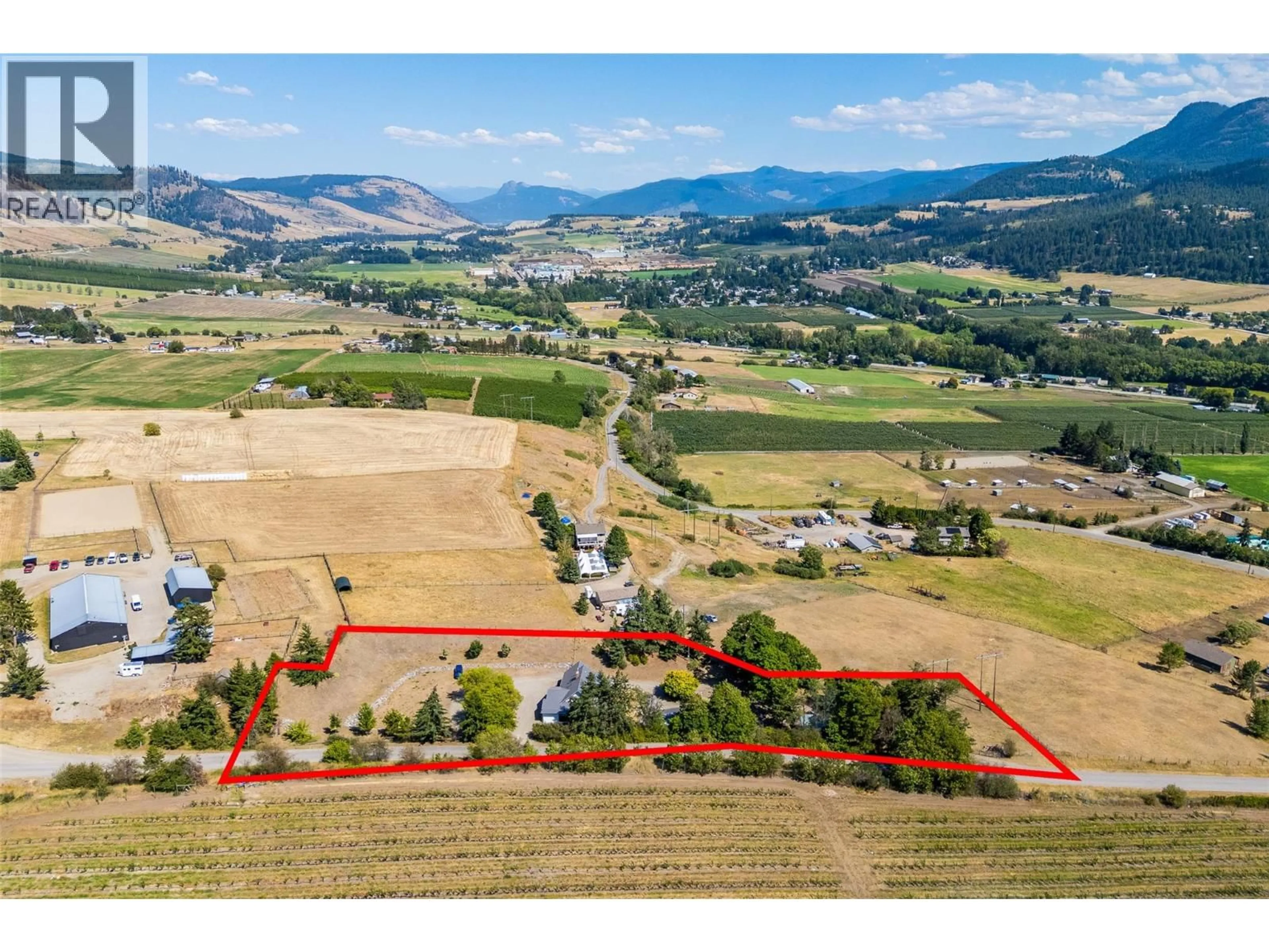 A pic from outside/outdoor area/front of a property/back of a property/a pic from drone, mountain view for 10421 WARREN ROAD, Vernon British Columbia V1B3C5