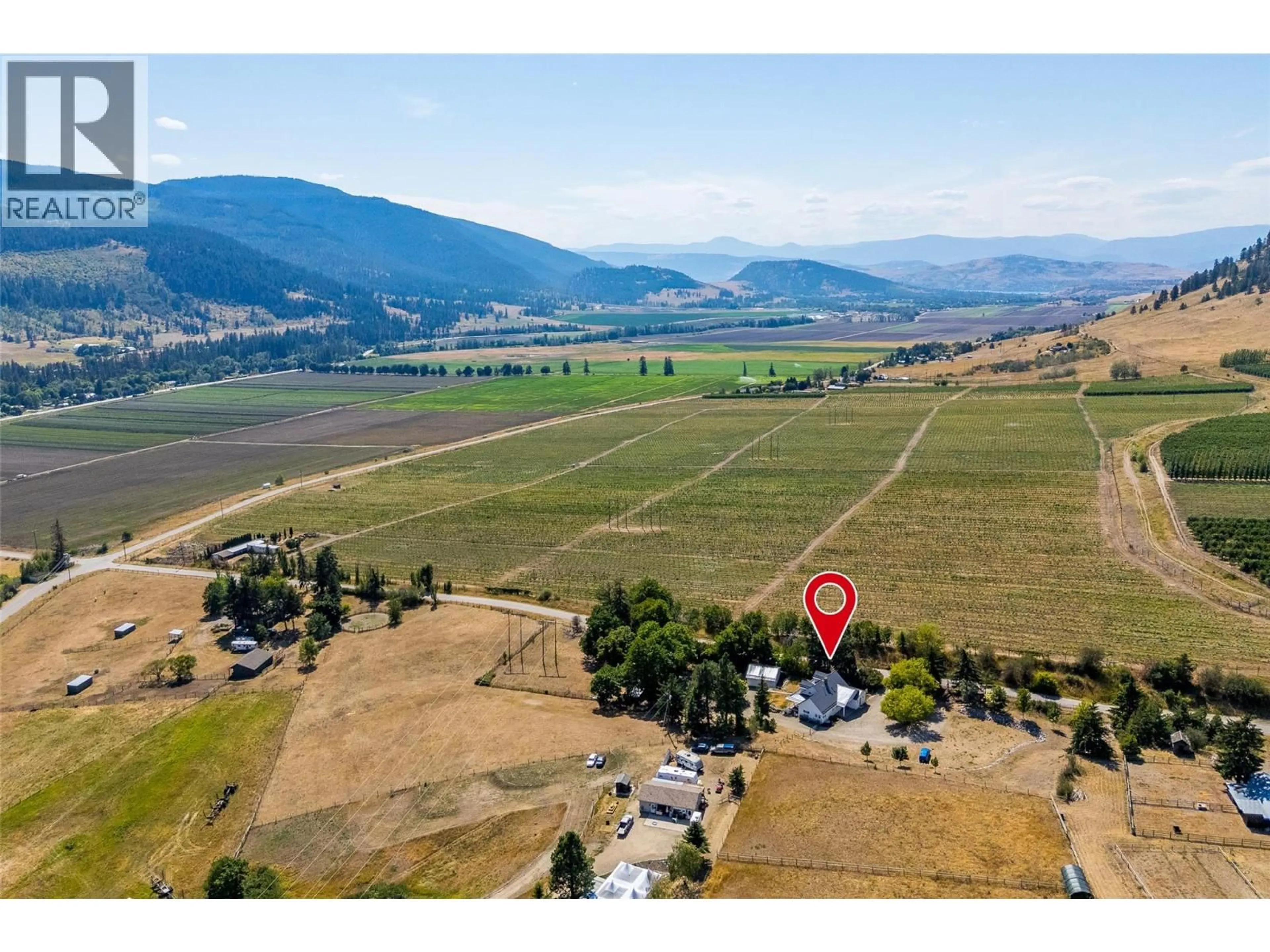 A pic from outside/outdoor area/front of a property/back of a property/a pic from drone, mountain view for 10421 WARREN ROAD, Vernon British Columbia V1B3C5