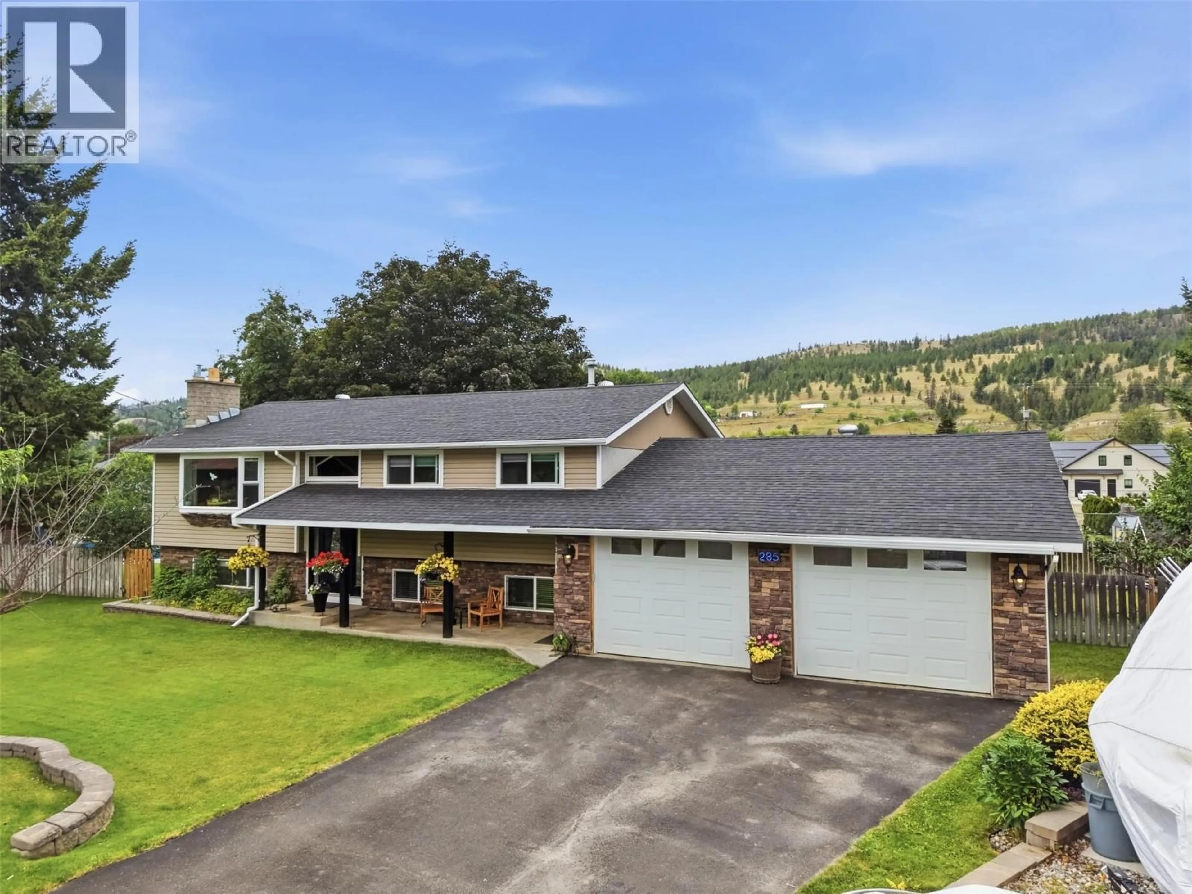 A pic from outside/outdoor area/front of a property/back of a property/a pic from drone, mountain view for 285 HUCKLEBERRY PLACE, Kamloops British Columbia V2H1M4