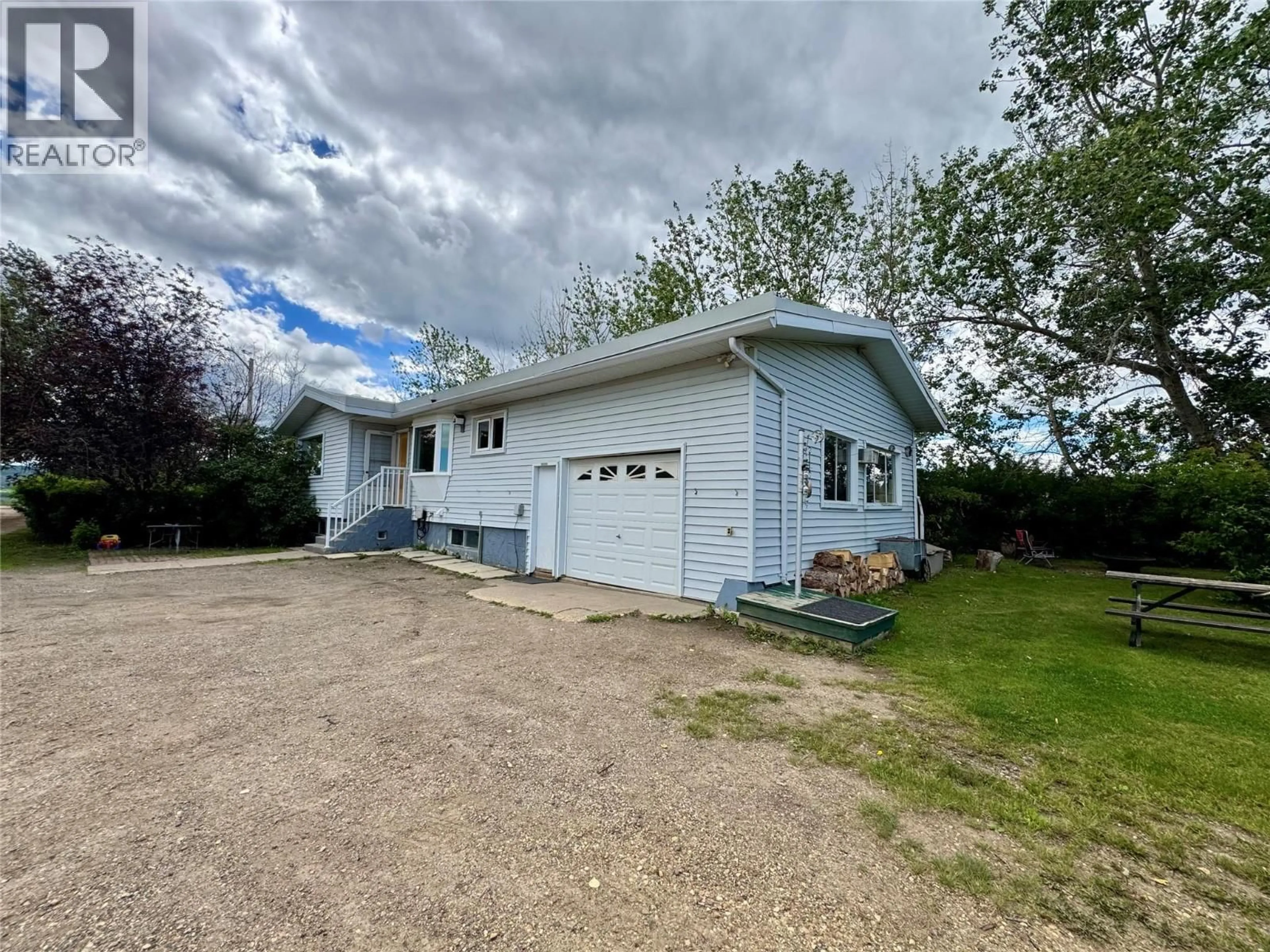 A pic from outside/outdoor area/front of a property/back of a property/a pic from drone, unknown for 3074 208 ROAD, Dawson Creek British Columbia V1G0C3