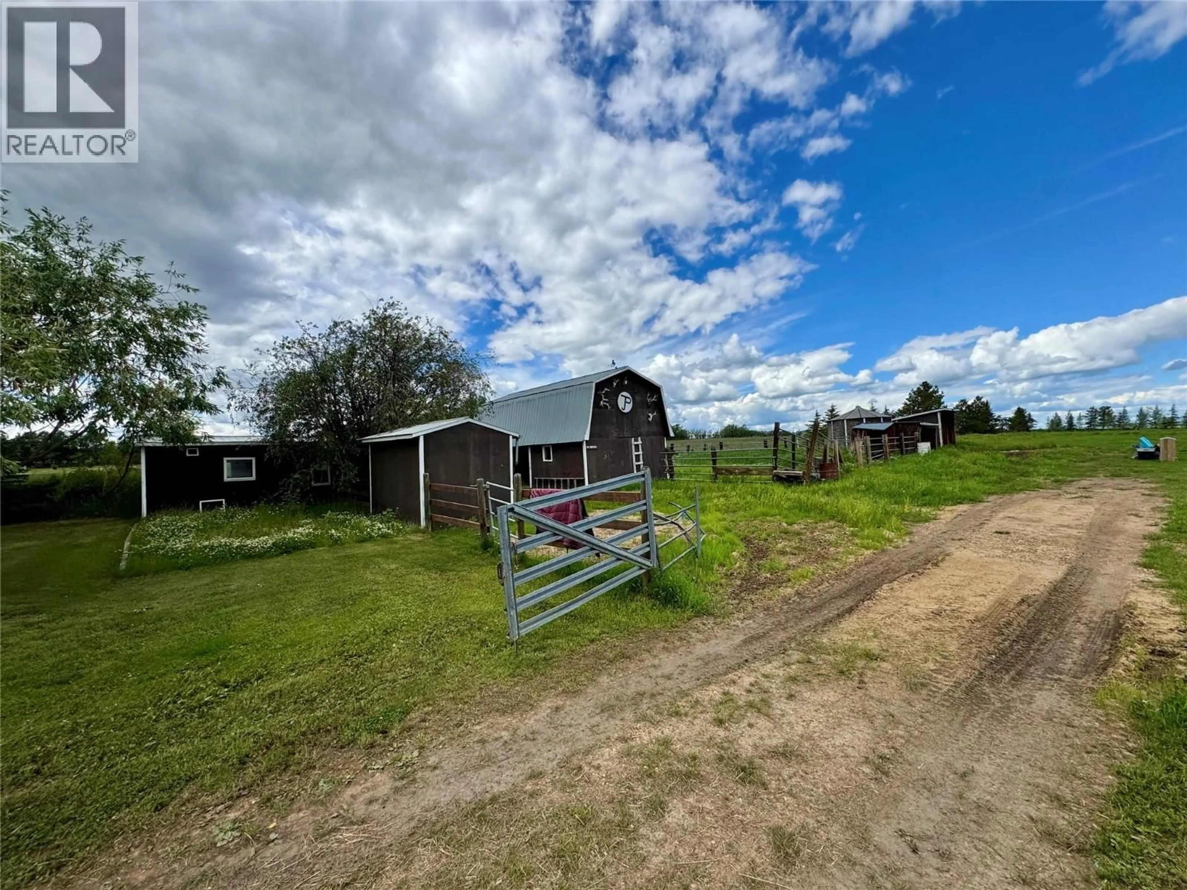 A pic from outside/outdoor area/front of a property/back of a property/a pic from drone, street for 3074 208 ROAD, Dawson Creek British Columbia V1G0C3