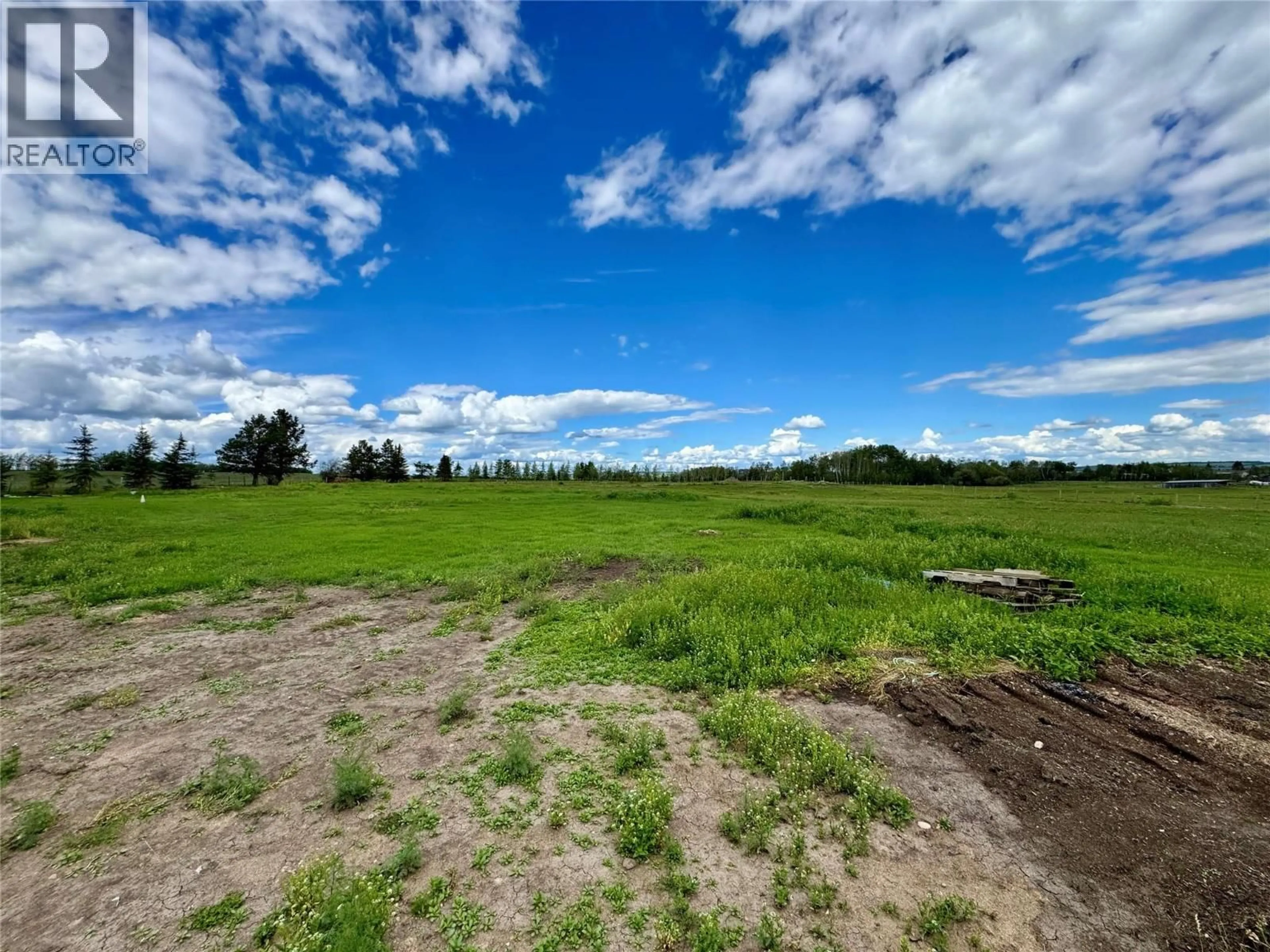 A pic from outside/outdoor area/front of a property/back of a property/a pic from drone, unknown for 3074 208 ROAD, Dawson Creek British Columbia V1G0C3