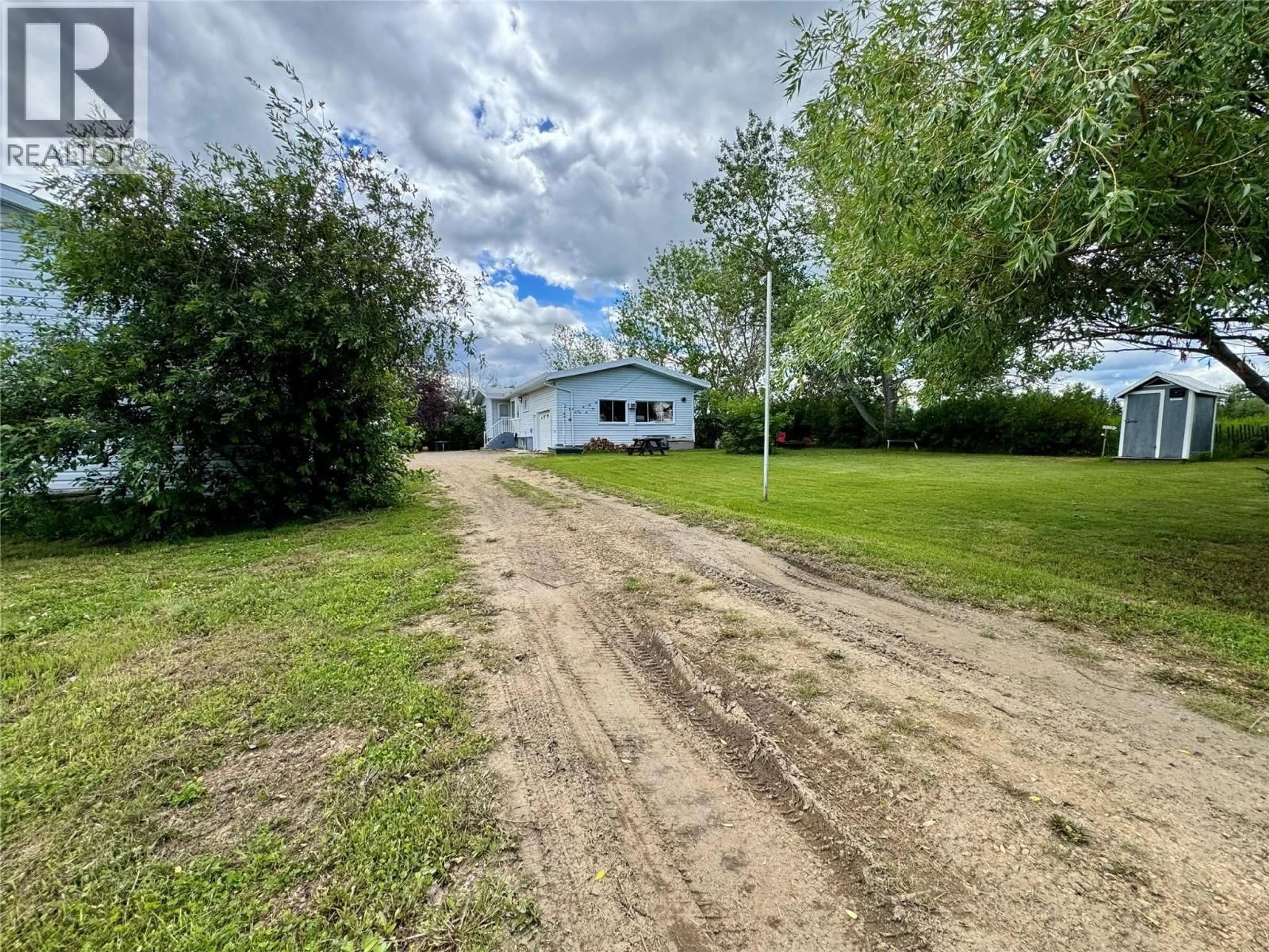 A pic from outside/outdoor area/front of a property/back of a property/a pic from drone, street for 3074 208 ROAD, Dawson Creek British Columbia V1G0C3