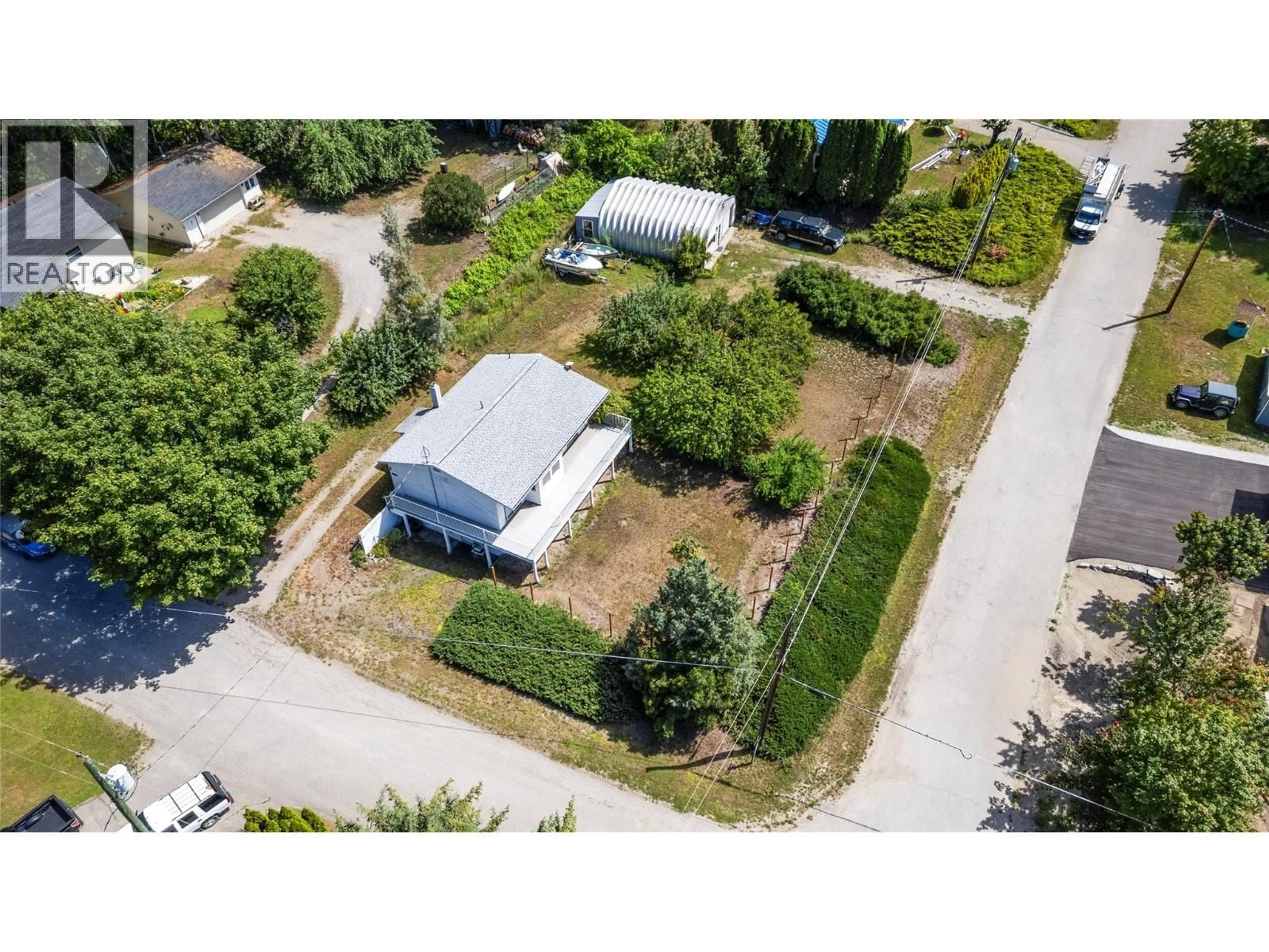A pic from outside/outdoor area/front of a property/back of a property/a pic from drone, street for 538 BEGBIE ROAD, Tappen British Columbia V0E2X1