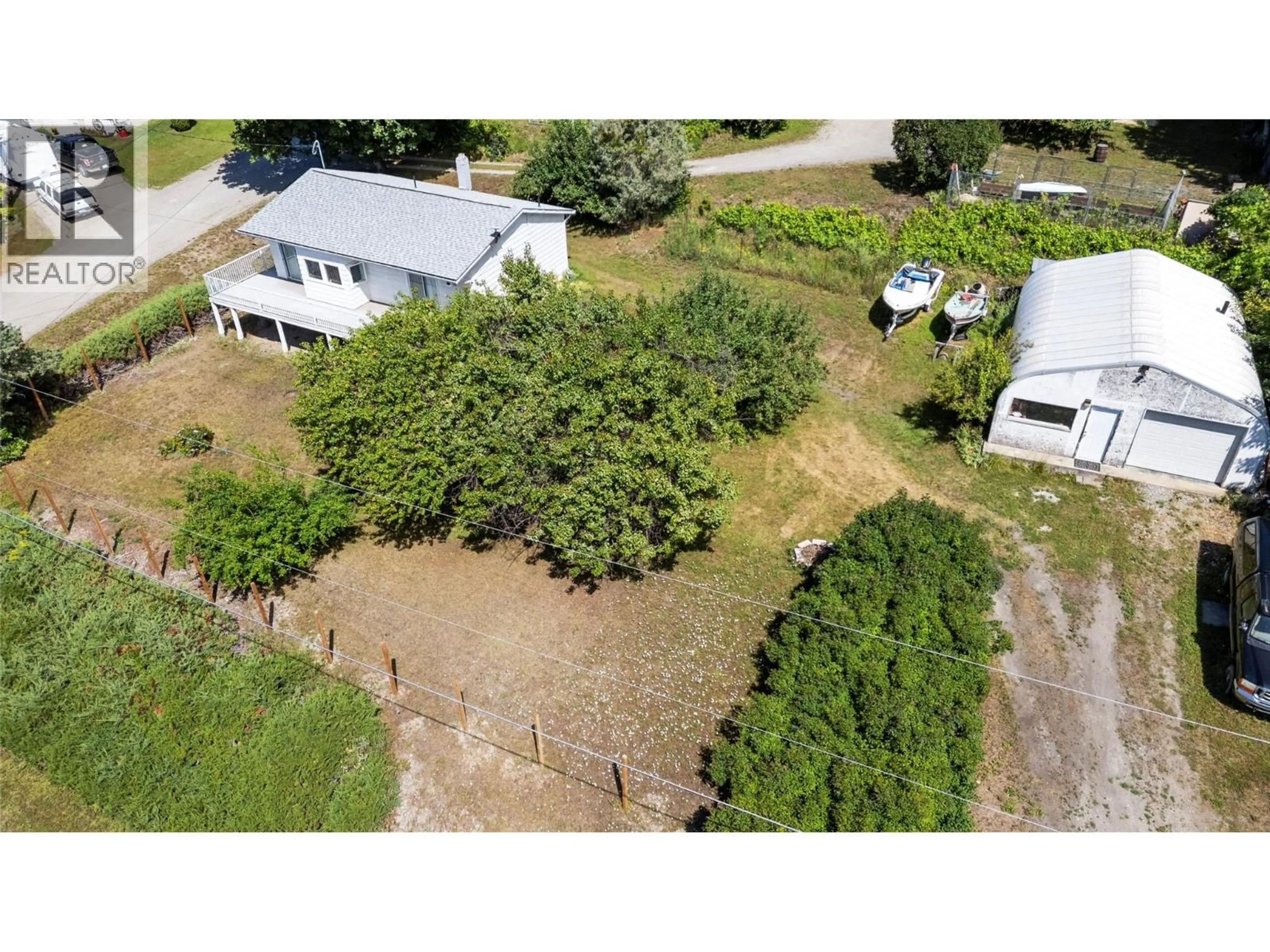 A pic from outside/outdoor area/front of a property/back of a property/a pic from drone, street for 538 BEGBIE ROAD, Tappen British Columbia V0E2X1