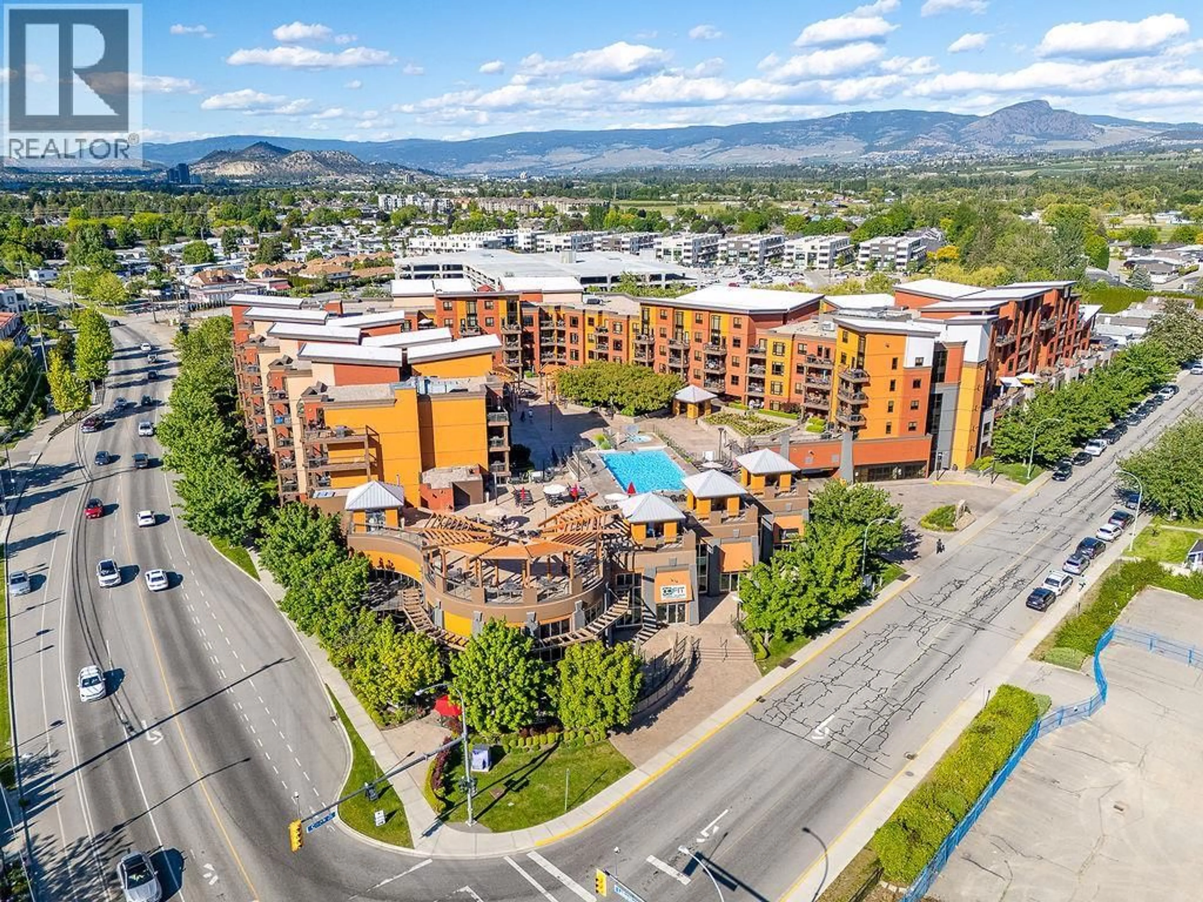 A pic from outside/outdoor area/front of a property/back of a property/a pic from drone, mountain view for 523 - 654 COOK ROAD, Kelowna British Columbia V1W3G7