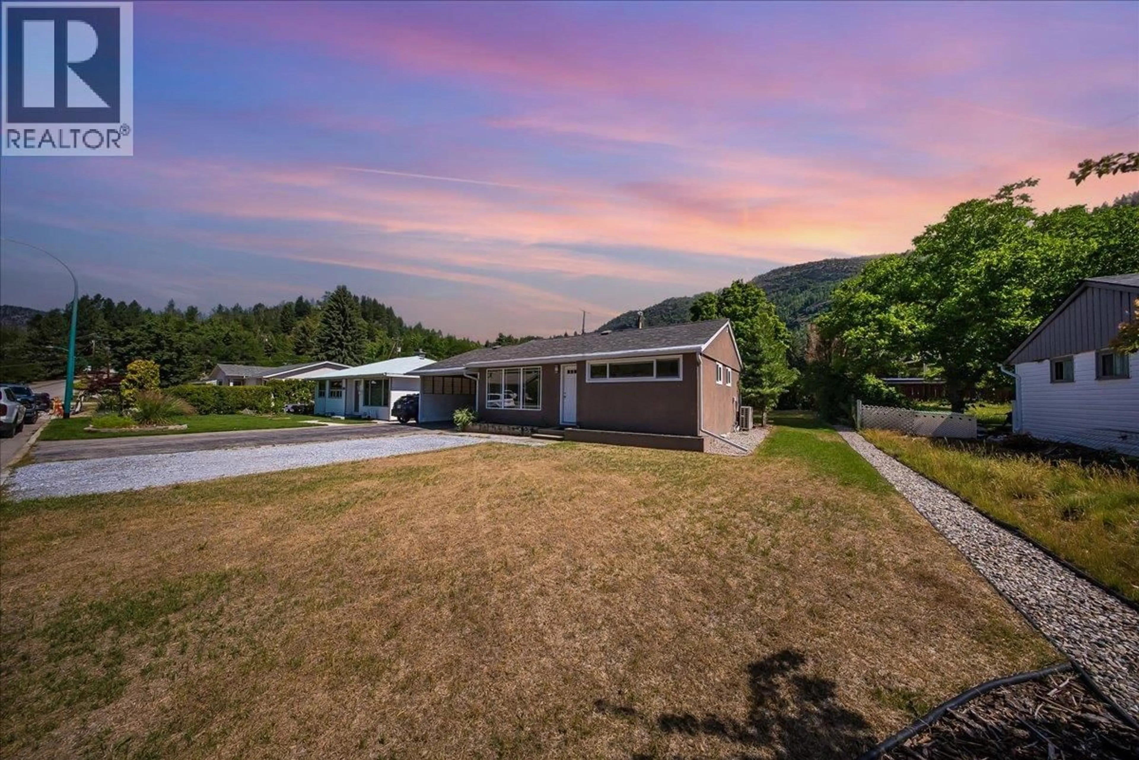 A pic from outside/outdoor area/front of a property/back of a property/a pic from drone, mountain view for 53 HAZLEWOOD DRIVE, Trail British Columbia V1R1G1