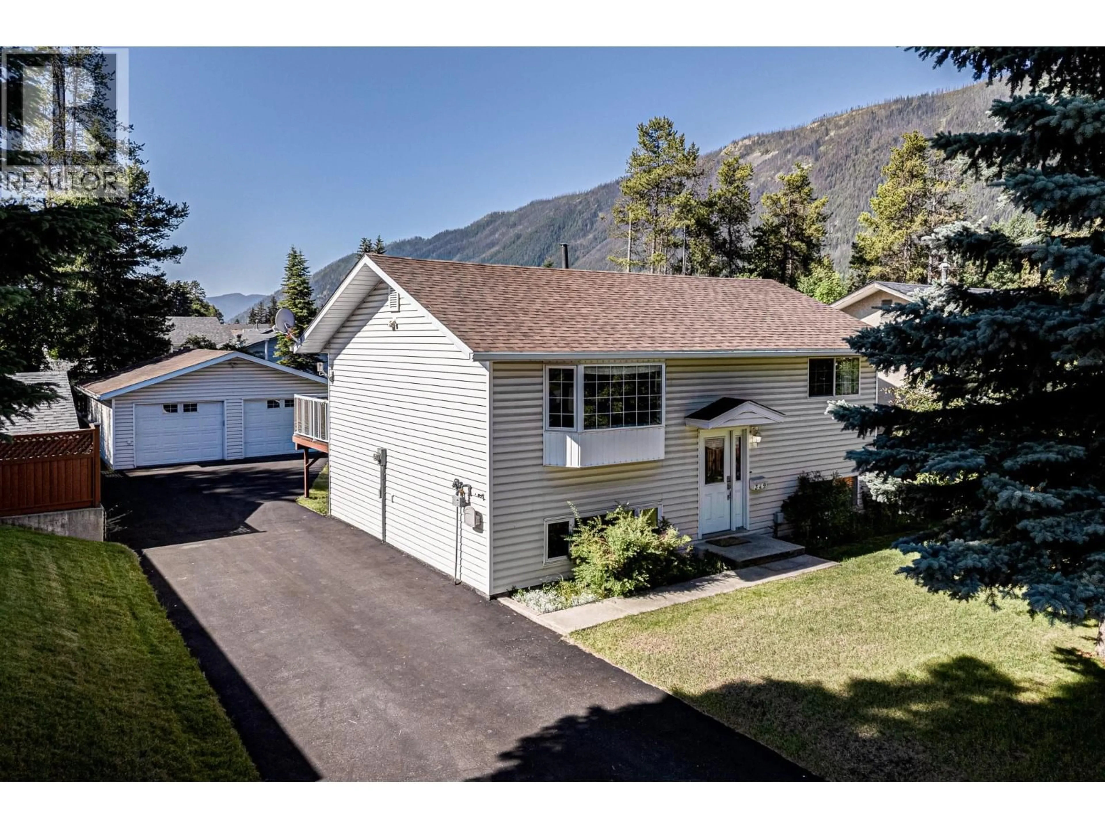 A pic from outside/outdoor area/front of a property/back of a property/a pic from drone, mountain view for 349 PACIFIC YEW CRESCENT, Sparwood British Columbia V0B2G0