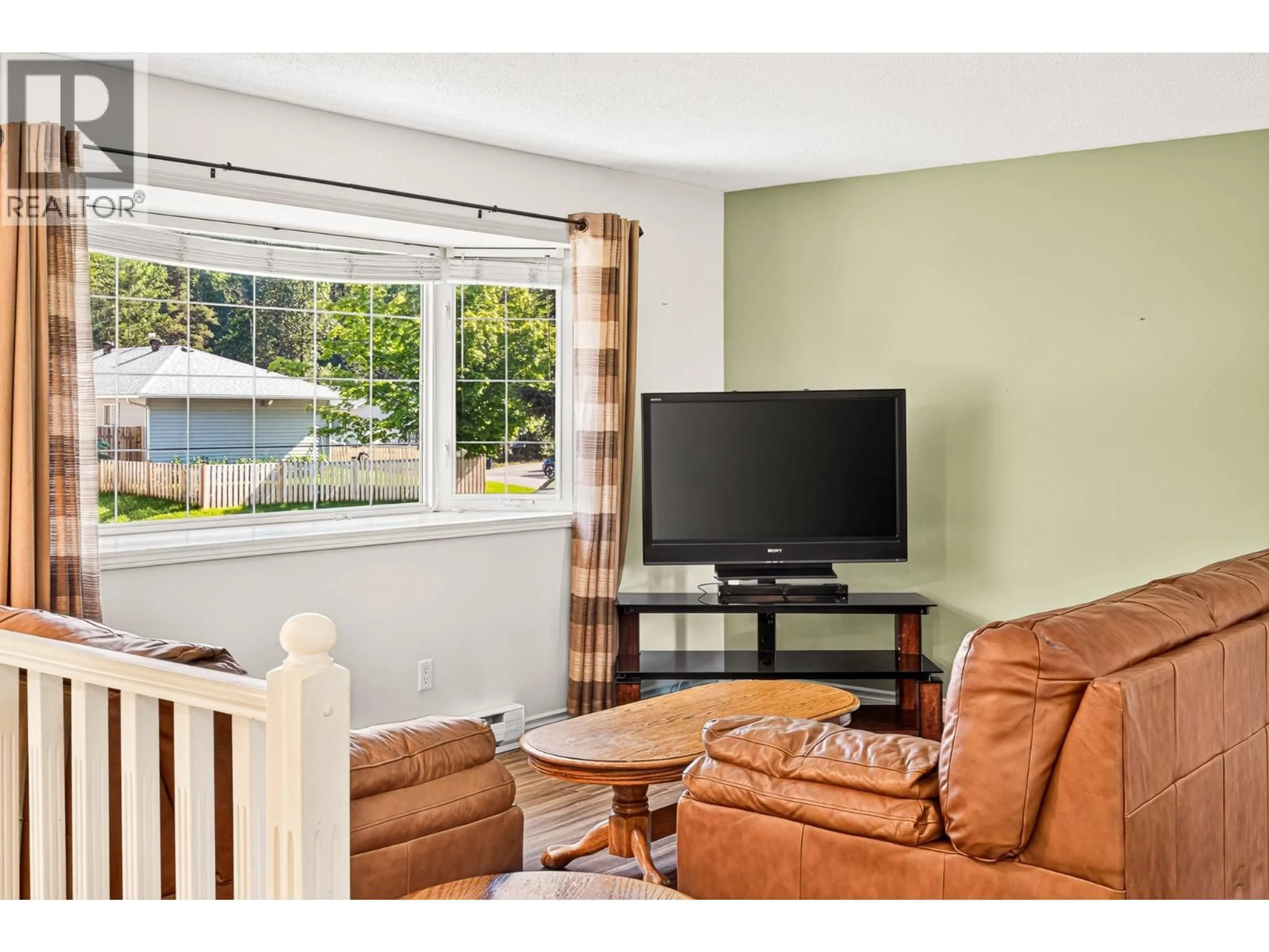 Living room with furniture, wood/laminate floor for 349 PACIFIC YEW CRESCENT, Sparwood British Columbia V0B2G0