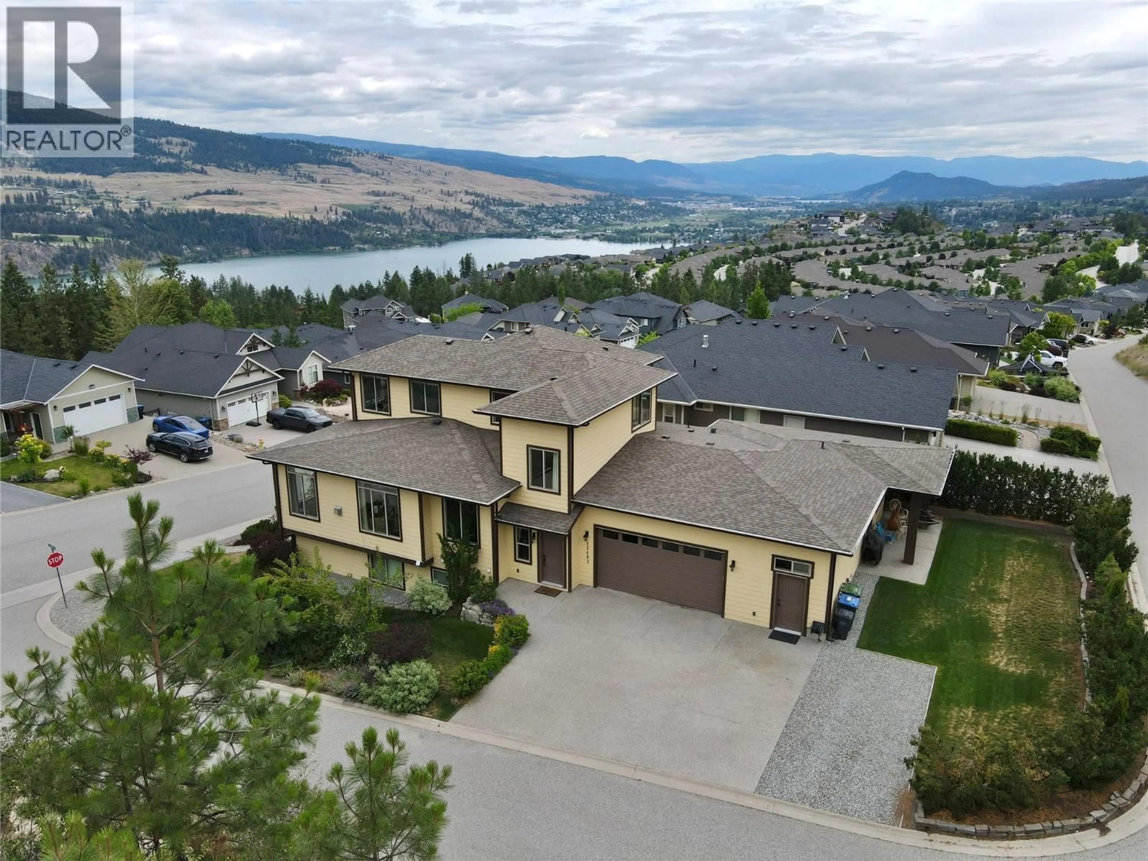 A pic from outside/outdoor area/front of a property/back of a property/a pic from drone, mountain view for 13492 LAKE HILL WAY, Lake Country British Columbia V4V2S7
