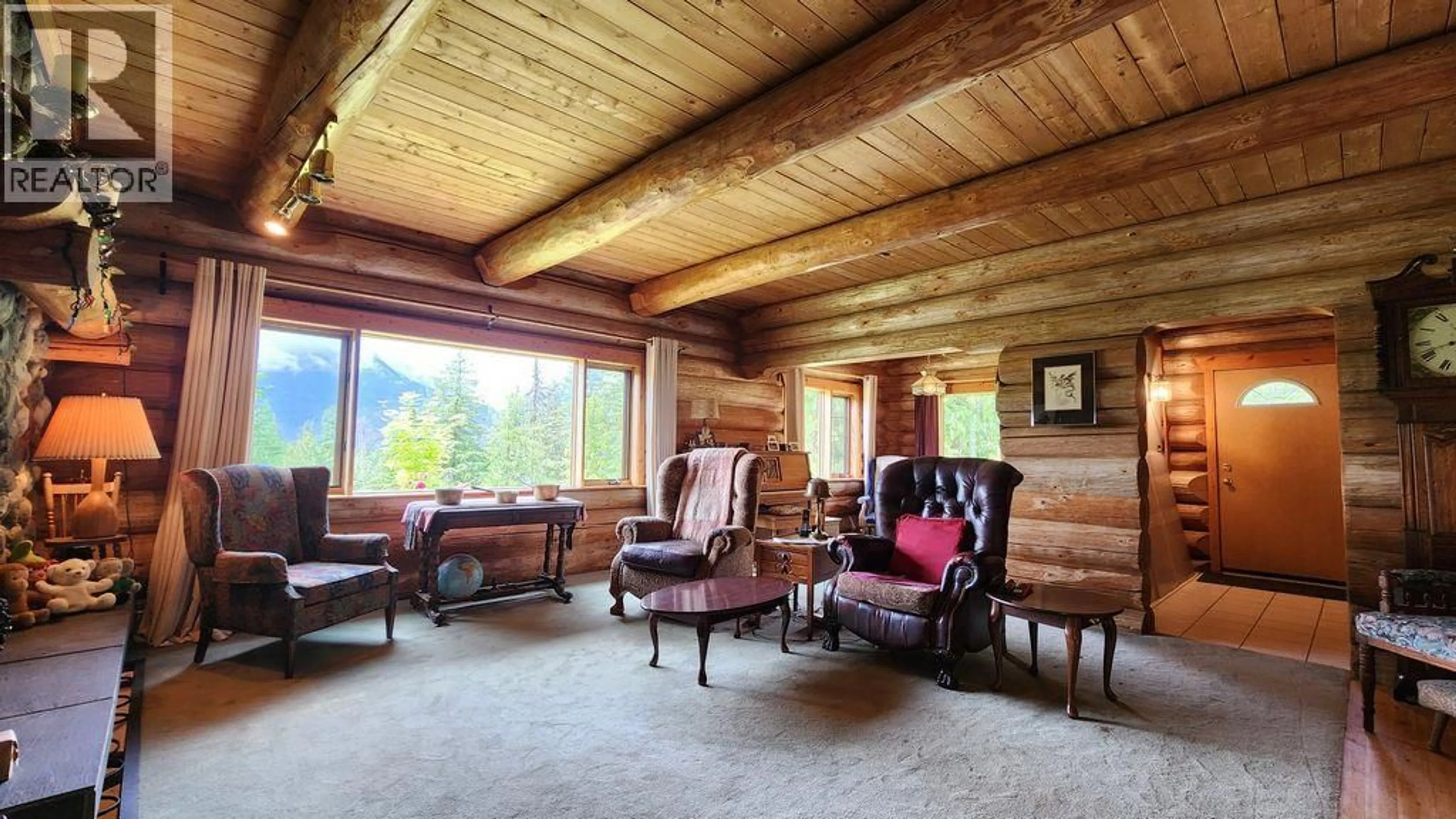 Living room with furniture, wood/laminate floor for 8470 RED MOUNTAIN ROAD, Silverton British Columbia V0G1S0