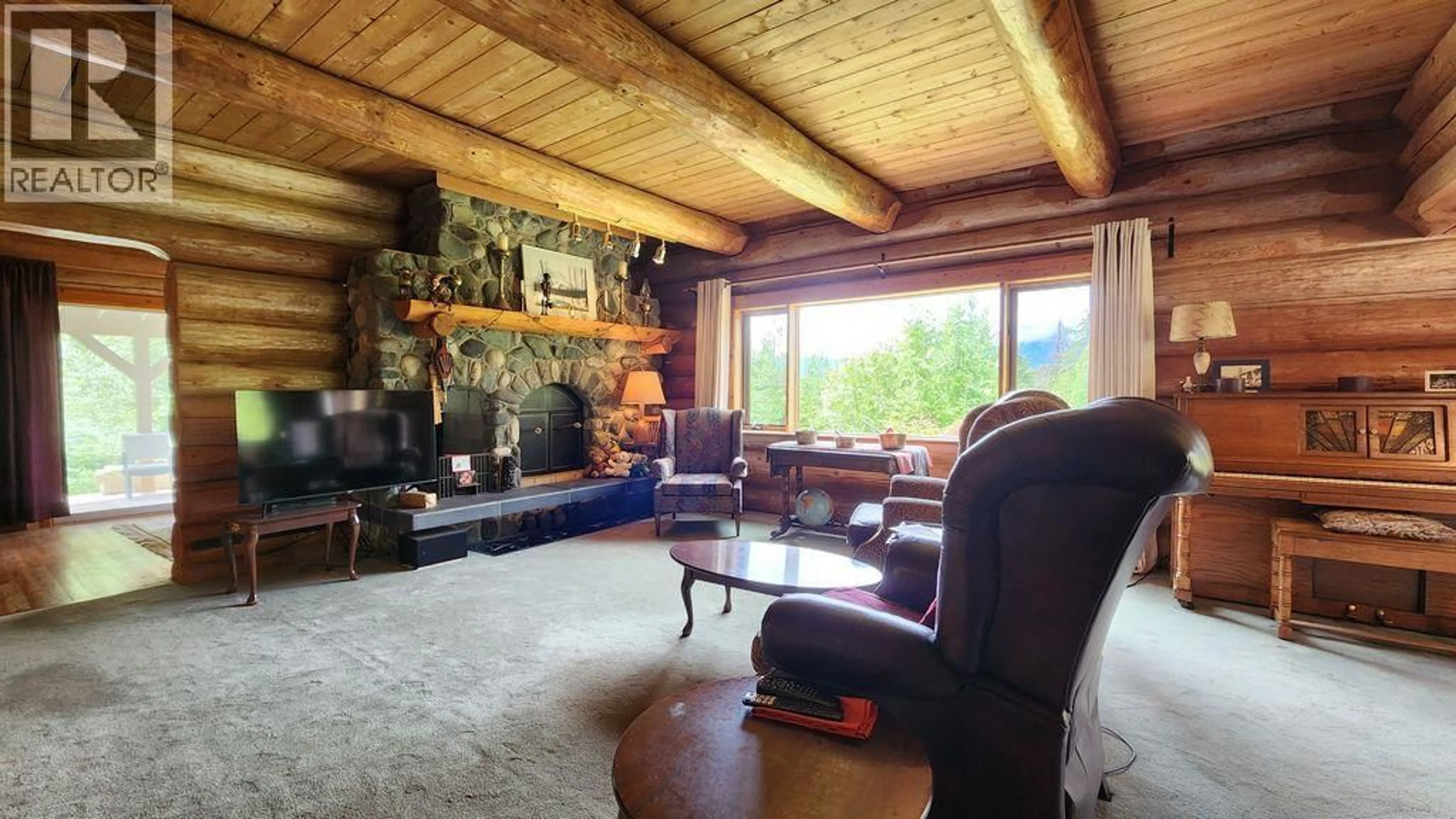 Living room with furniture, wood/laminate floor for 8470 RED MOUNTAIN ROAD, Silverton British Columbia V0G1S0