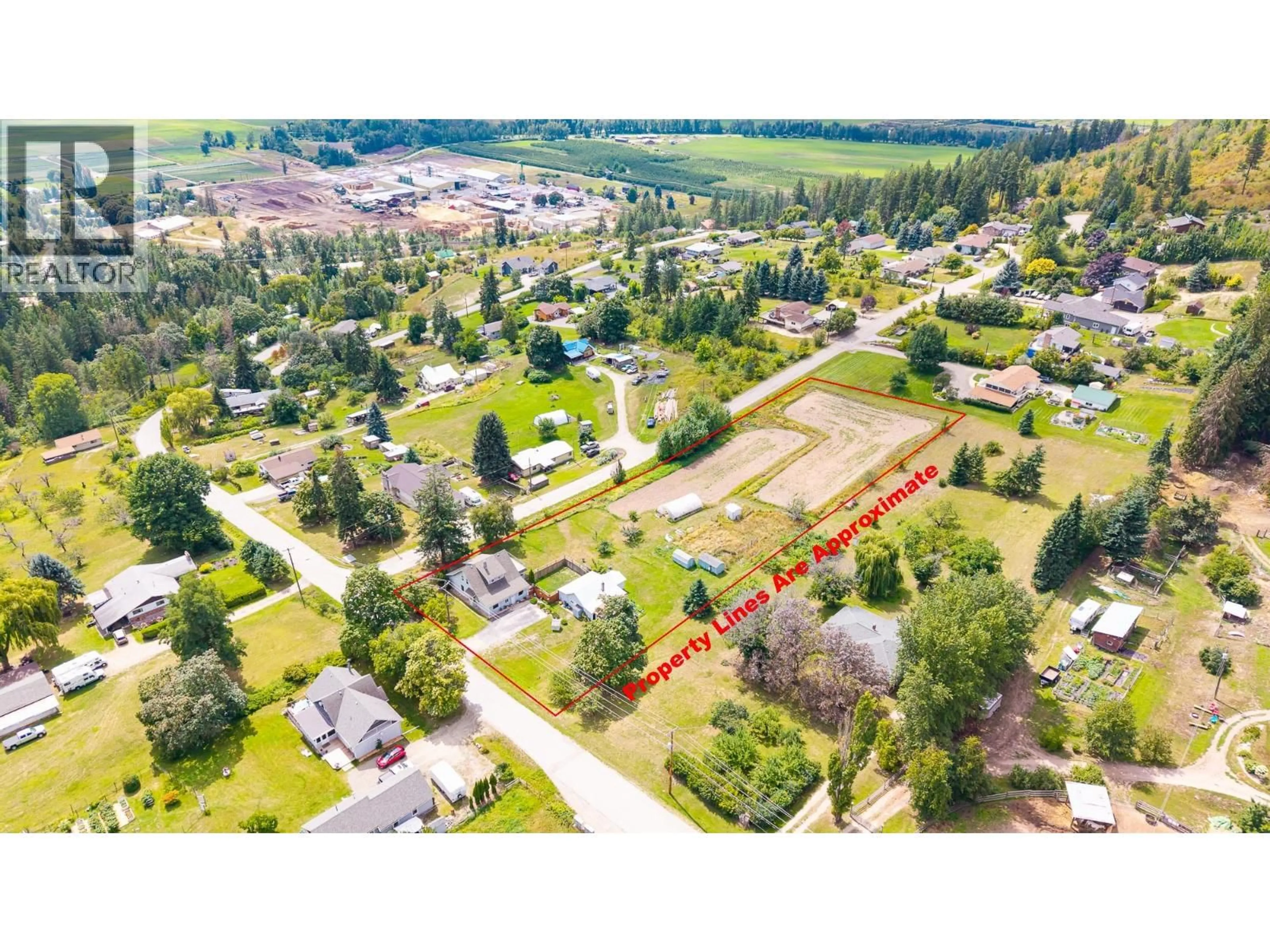 A pic from outside/outdoor area/front of a property/back of a property/a pic from drone, street for 5315 CORY ROAD, Wynndel British Columbia V0B2N1